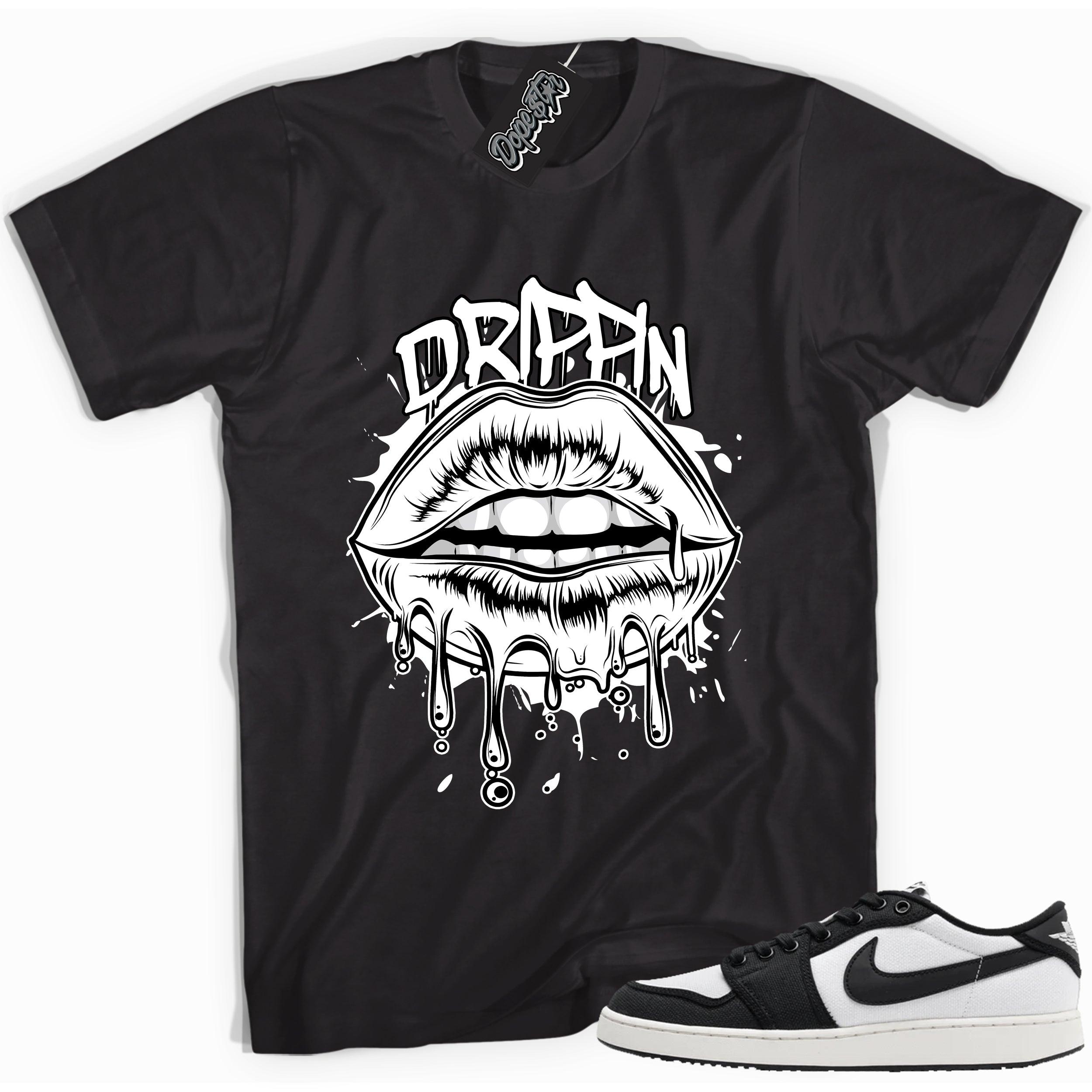 Cool black graphic tee with 'drippin' print, that perfectly matches Air Jordan 1 Retro Ajko Low Black & White sneakers.