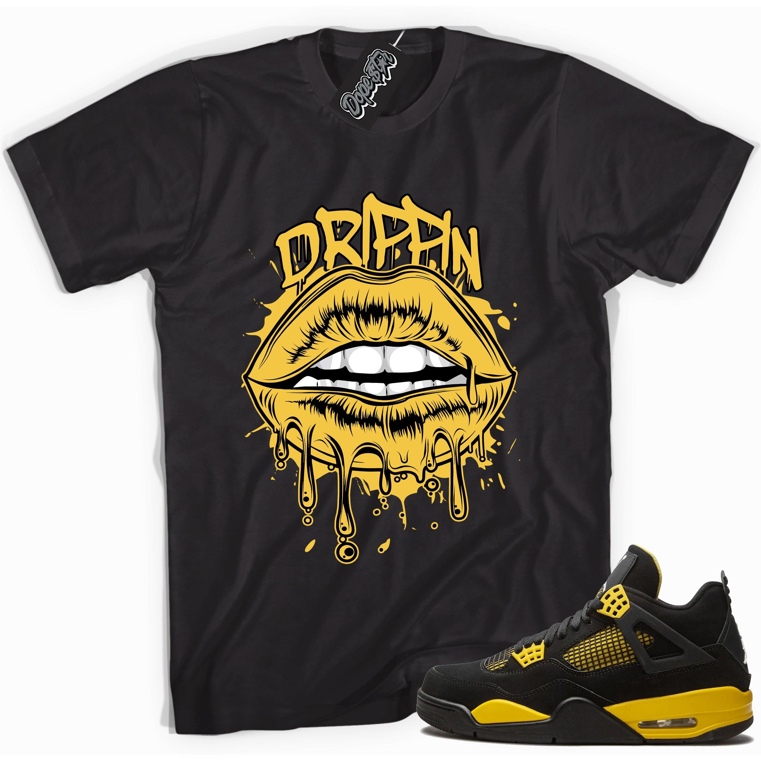 Cool black graphic tee with 'drippin' print, that perfectly matches  Air Jordan 4 Thunder sneakers