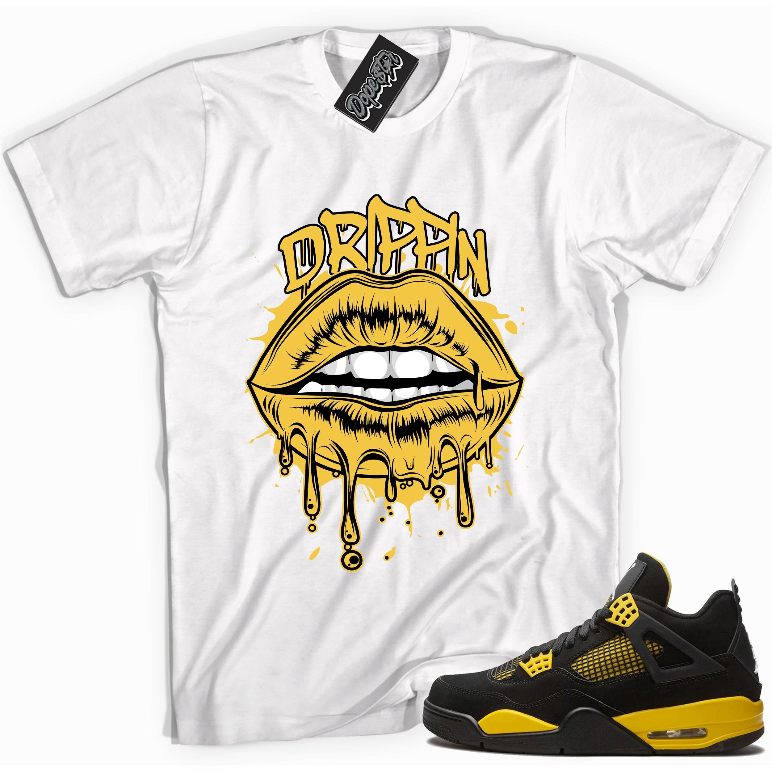 Cool white graphic tee with 'drippin' print, that perfectly matches Air Jordan 4 Thunder sneakers