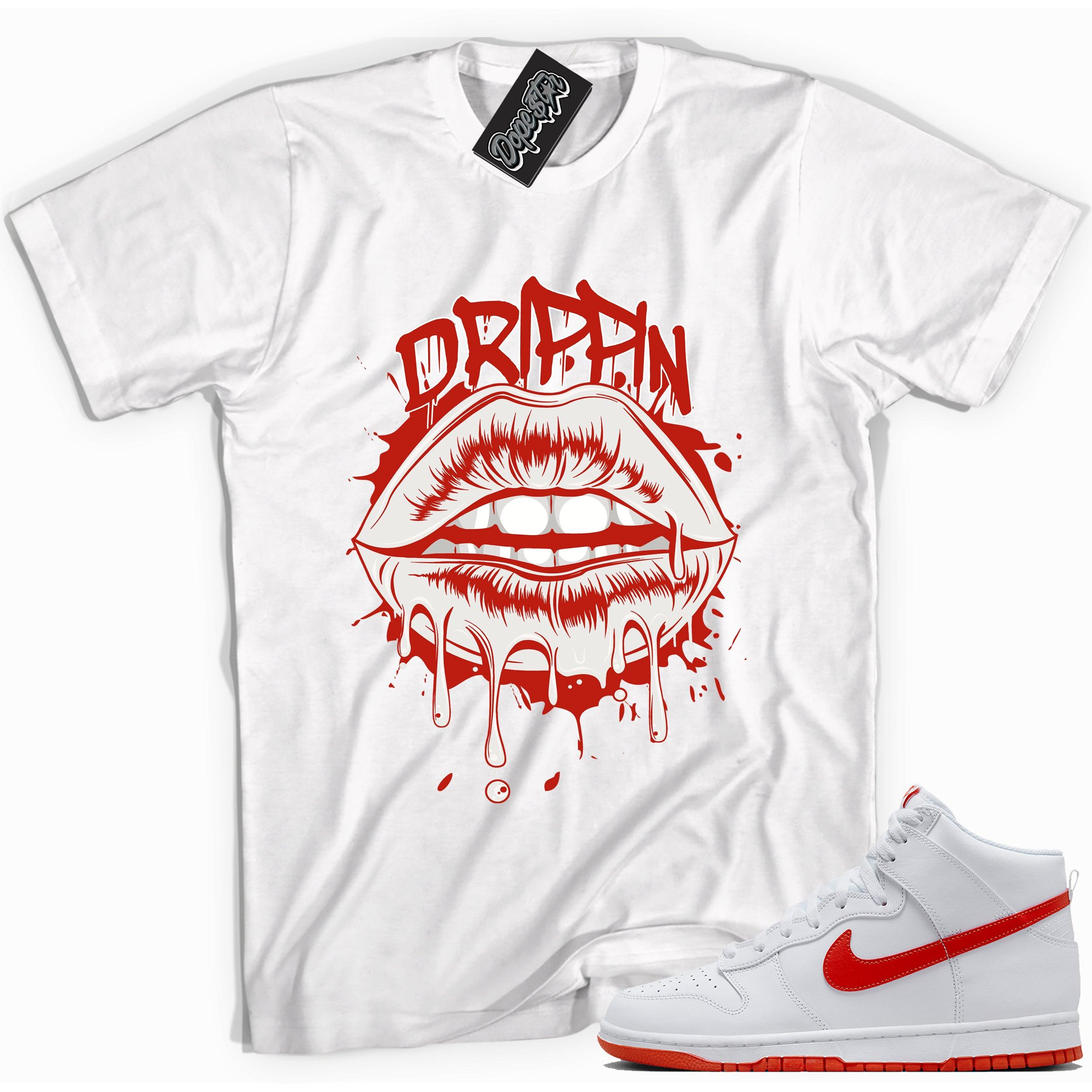Cool white graphic tee with 'dripping' print, that perfectly matches Nike Dunk High White Picante Red sneakers.