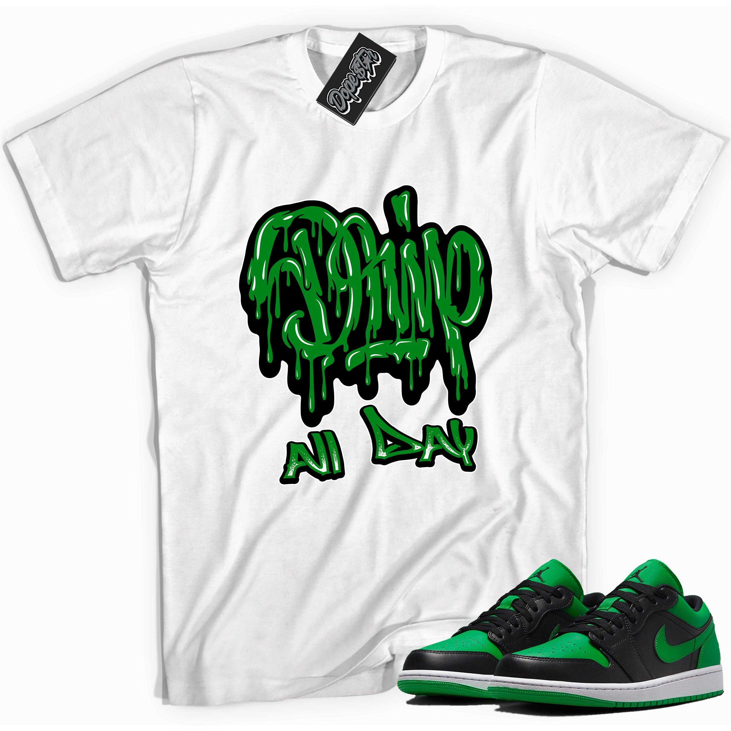 Cool white graphic tee with 'Drip All Day' print, that perfectly matches Air Jordan 1 Low Lucky Green sneakers