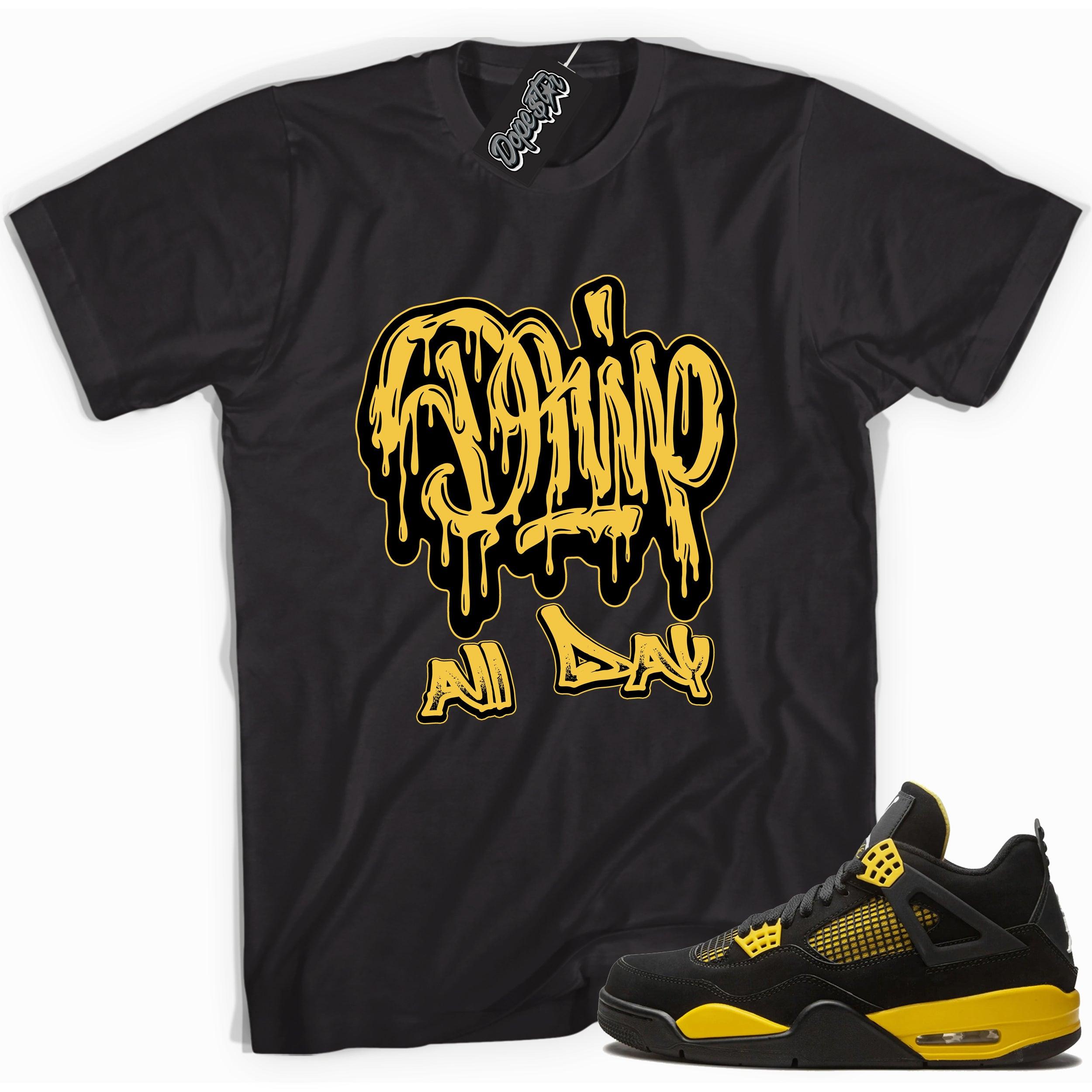 Cool black graphic tee with 'drip all day' print, that perfectly matches  Air Jordan 4 Thunder sneakers