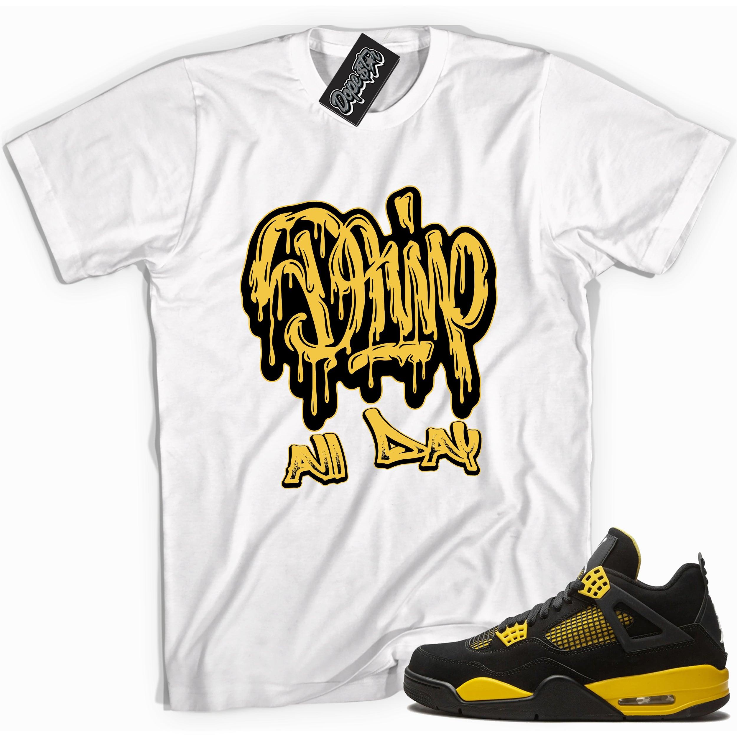 Cool white graphic tee with 'drip all day' print, that perfectly matches Air Jordan 4 Thunder sneakers