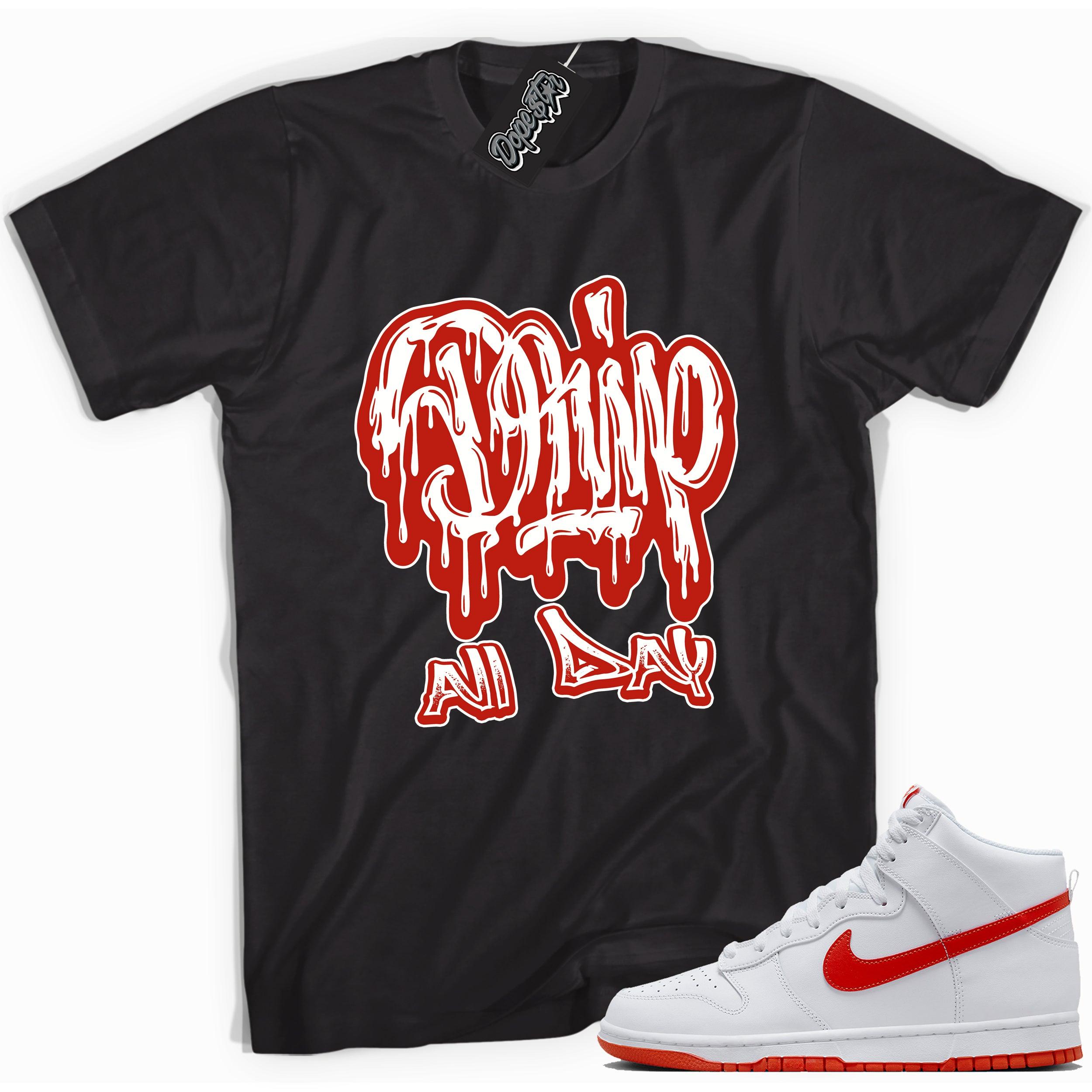 Cool black graphic tee with 'drip all day' print, that perfectly matches Nike Dunk High White Picante Red sneakers.