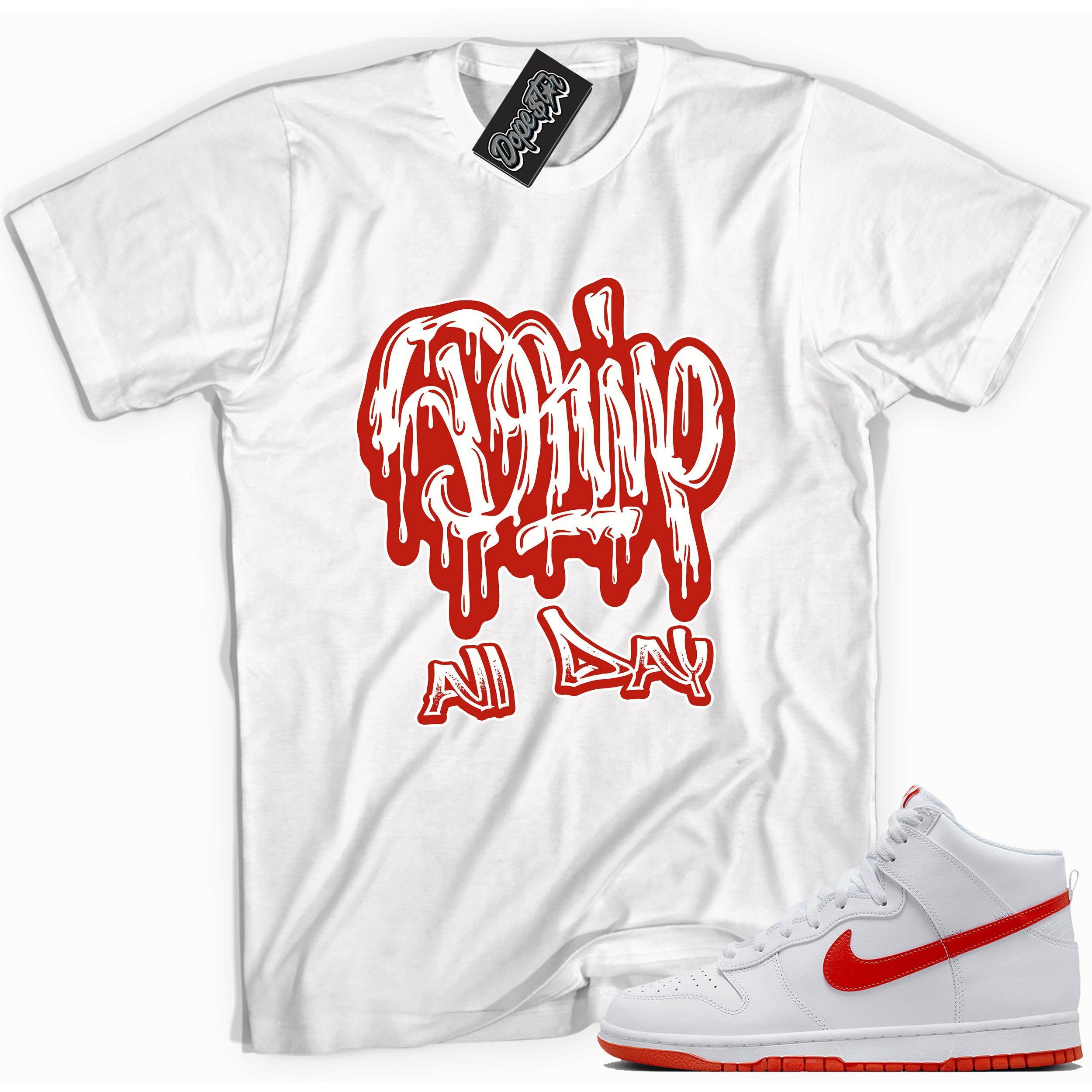 Cool white graphic tee with 'drip all day' print, that perfectly matches Nike Dunk High White Picante Red sneakers.