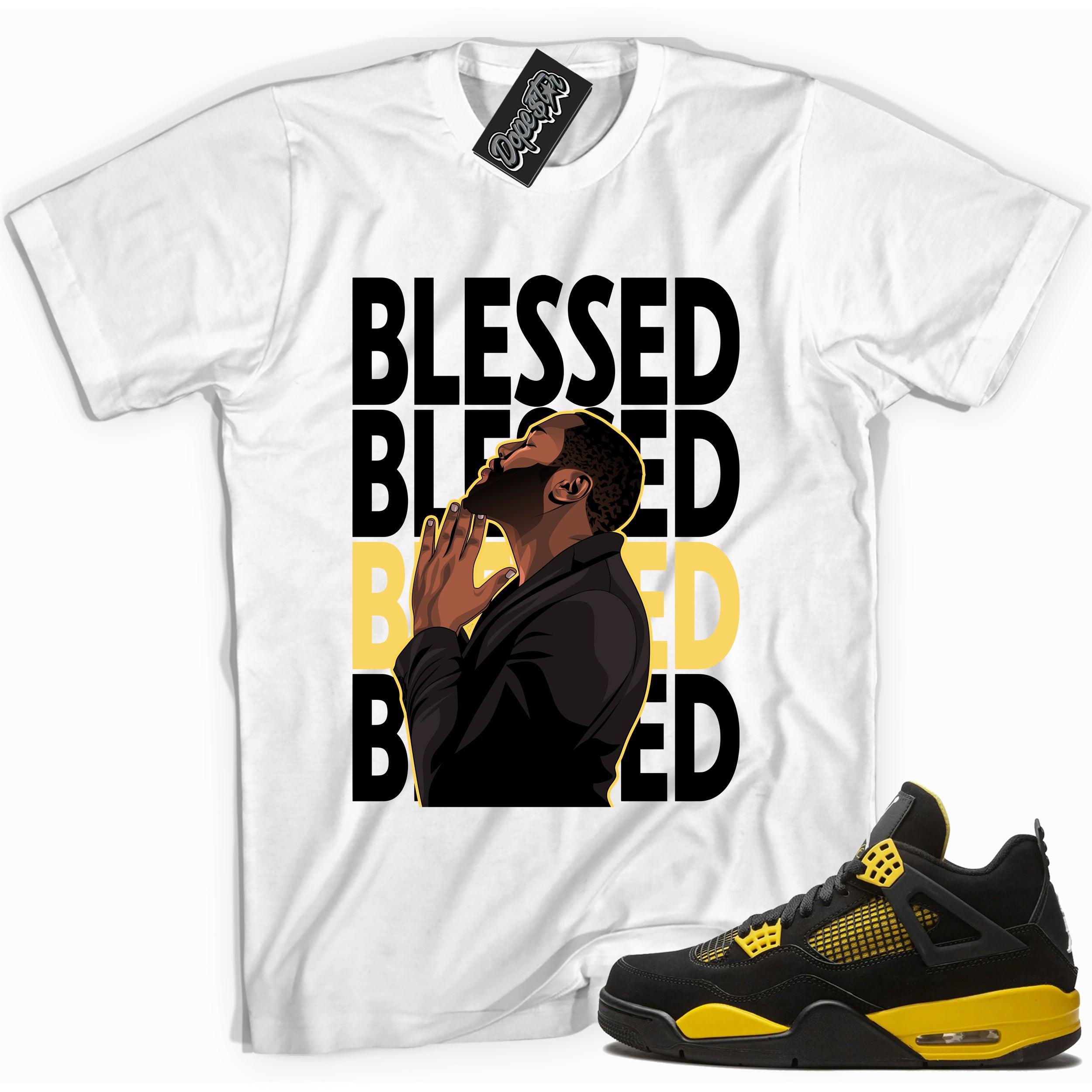 Cool white graphic tee with 'blessed king' print, that perfectly matches Air Jordan 4 Thunder sneakers