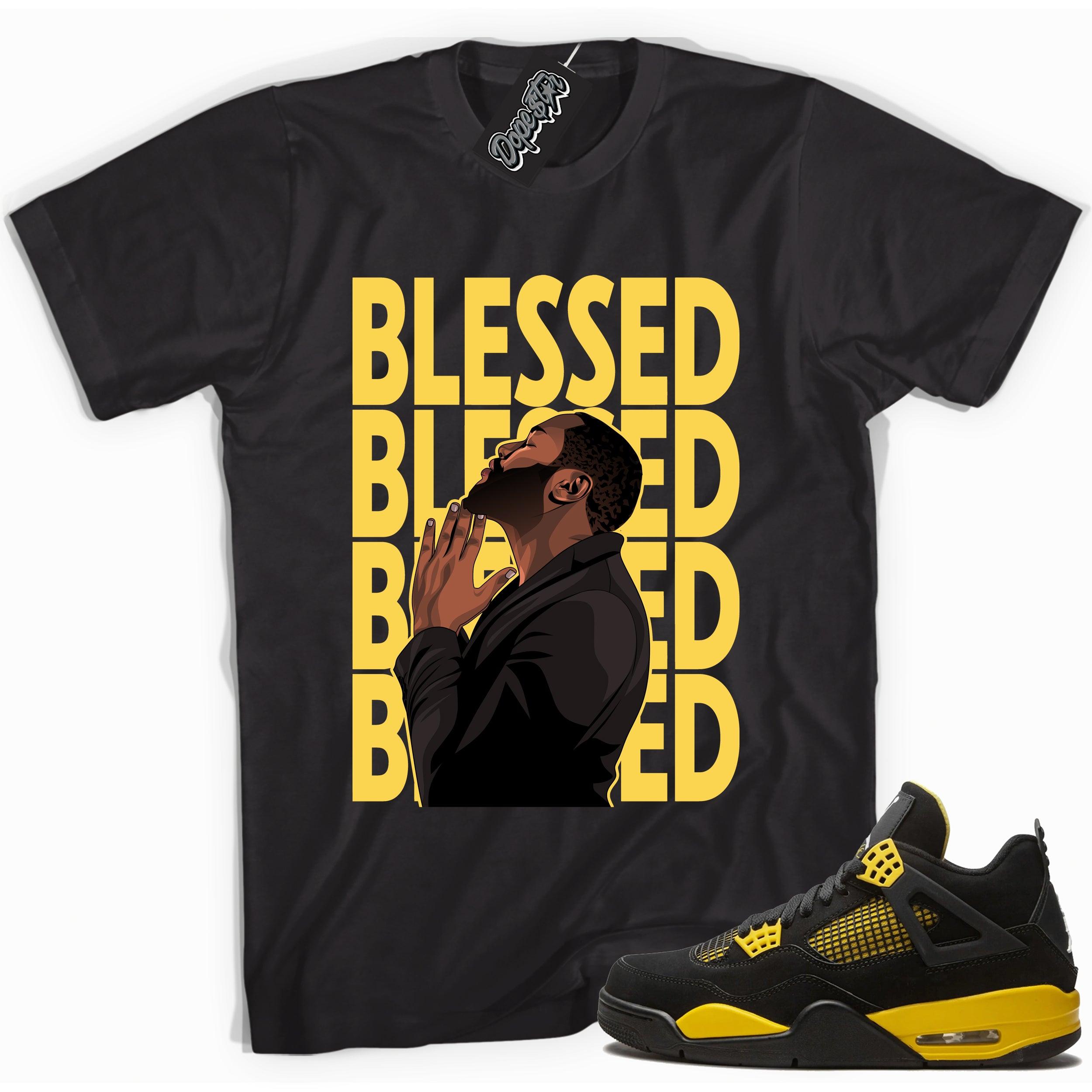 Cool black graphic tee with 'god blessed' print, that perfectly matches  Air Jordan 4 Thunder sneakers