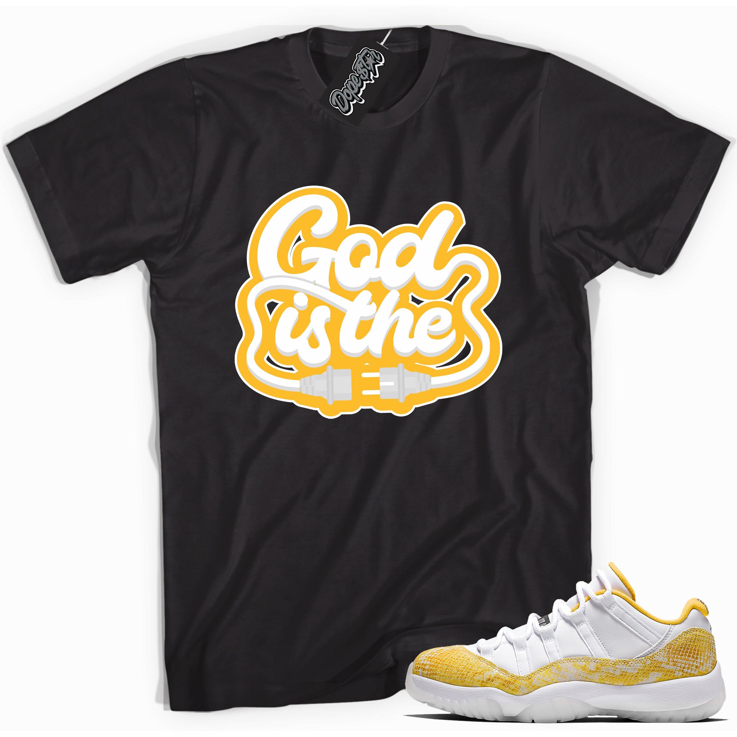 Cool black graphic tee with 'god is the plug' print, that perfectly matches  Air Jordan 11 Low Yellow Snakeskin sneakers