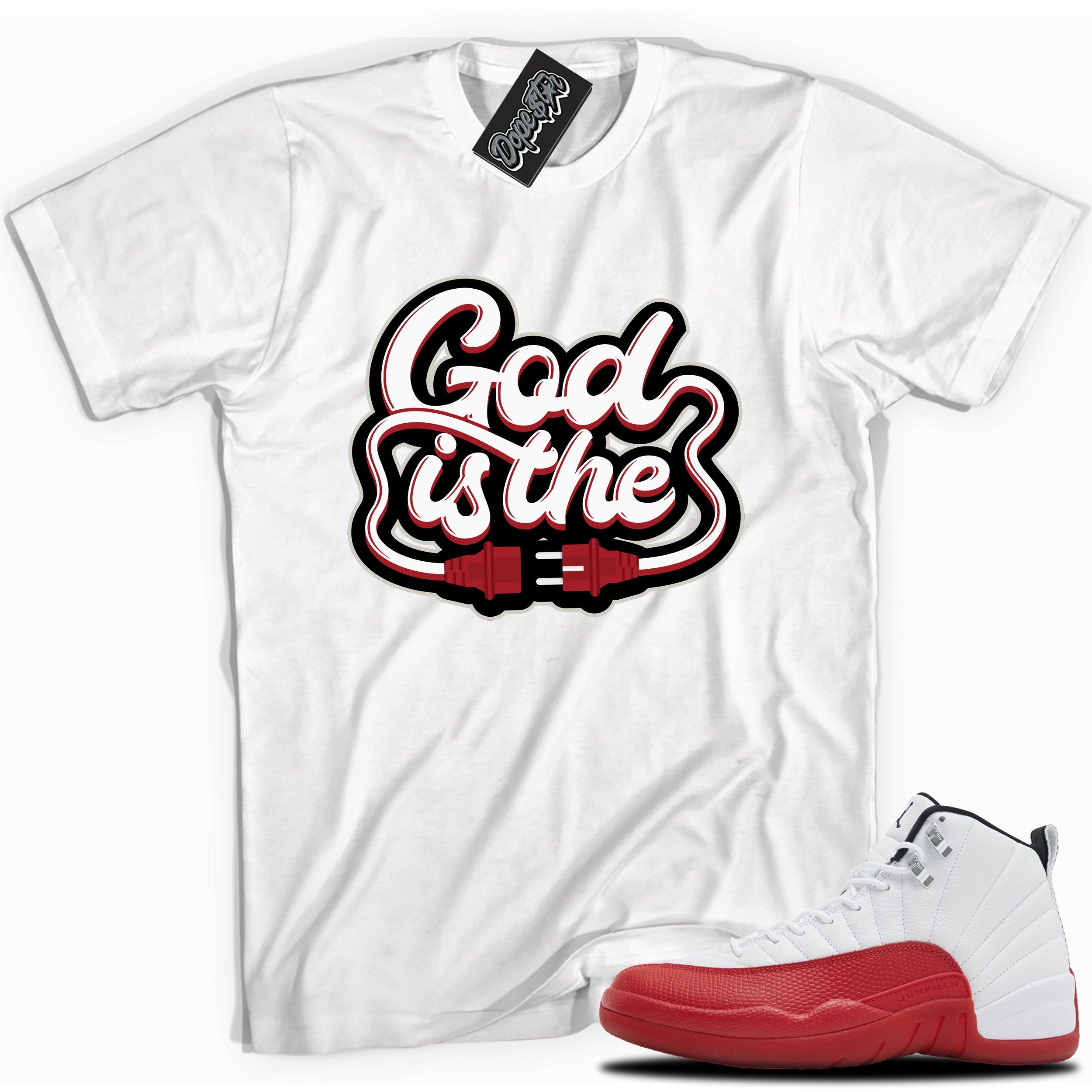 Cool White graphic tee with “ GOD IS THE ” print, that perfectly matches Air Jordan 12 Retro Cherry Red 2023 red and white sneakers 