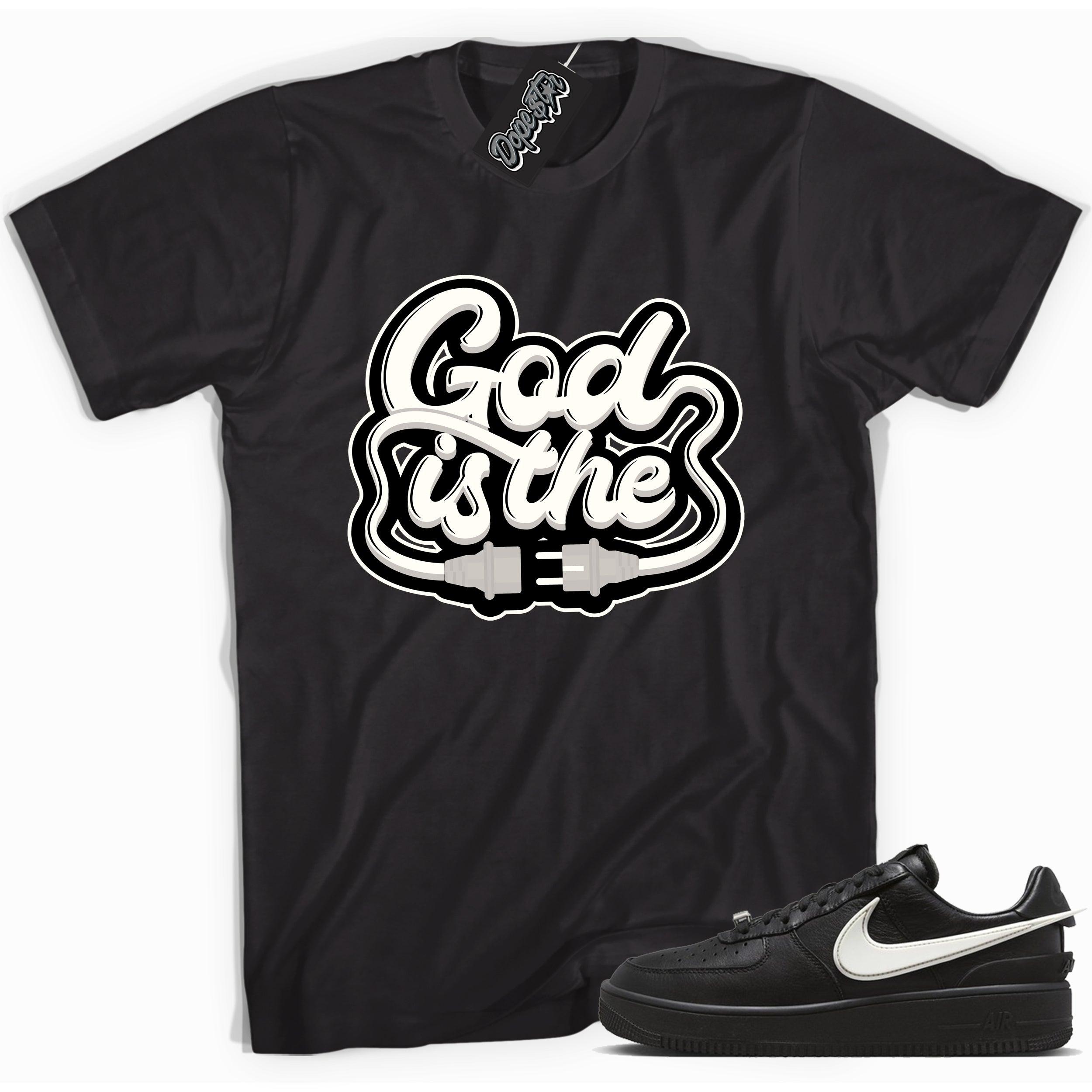 Cool black graphic tee with 'god is the plug' print, that perfectly matches Nike Air Force 1 Low SP Ambush Phantom sneakers.