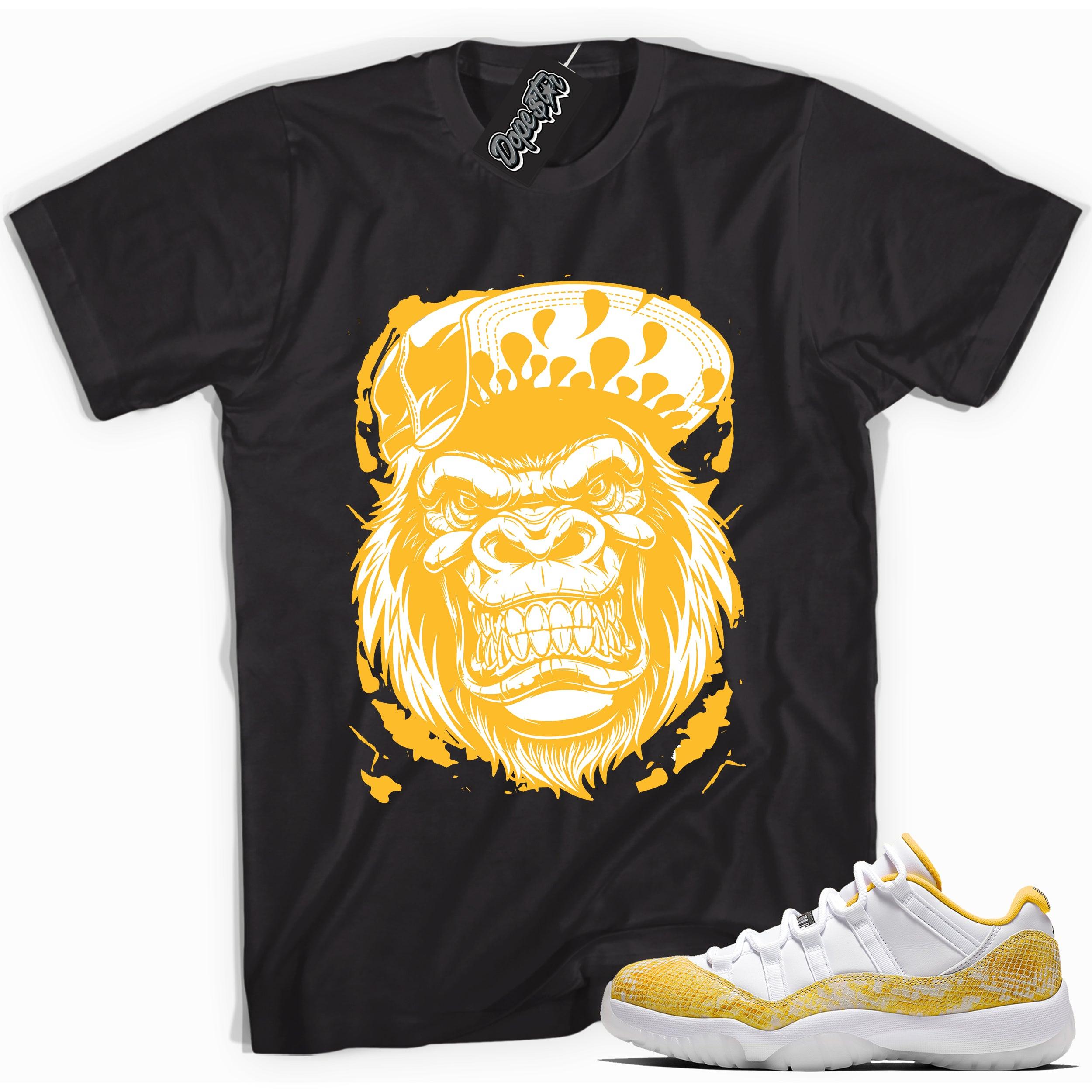 Cool black graphic tee with 'gorilla beast' print, that perfectly matches  Air Jordan 11 Low Yellow Snakeskin sneakers