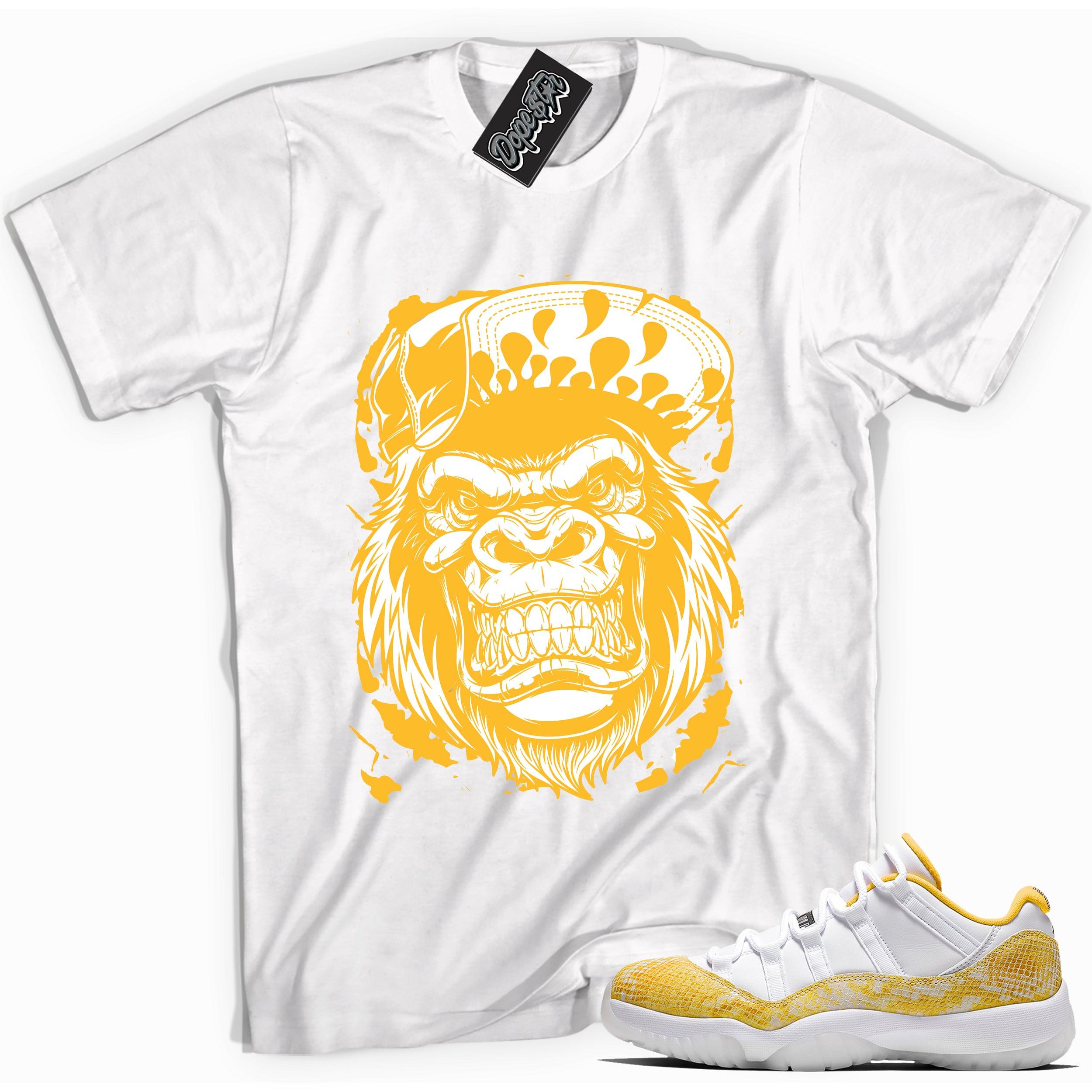 Cool white graphic tee with 'gorilla beast' print, that perfectly matches Air Jordan 11 Low Yellow Snakeskin sneakers