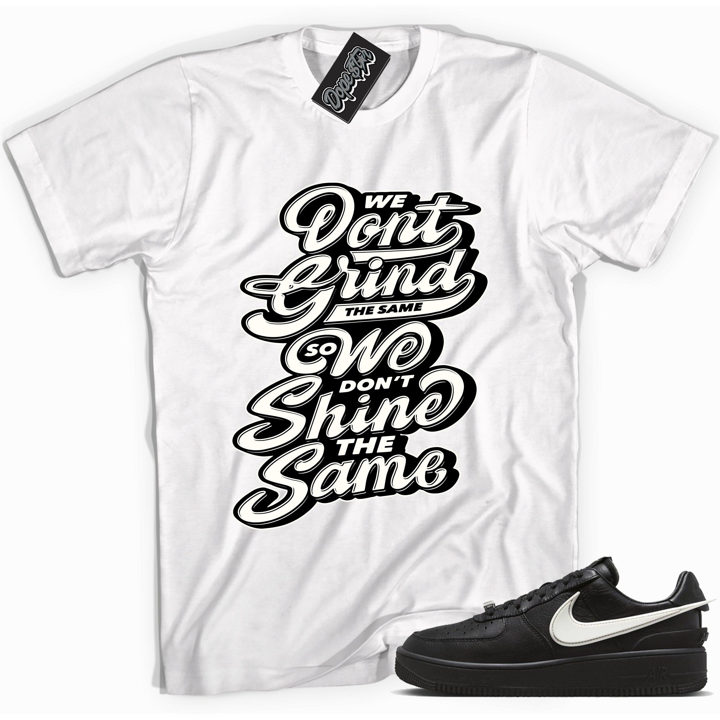 Cool white graphic tee with 'we dont grind the same so we dont shine the same' print, that perfectly matches Nike Air Force 1 Low Ambush Phantom Black sneakers