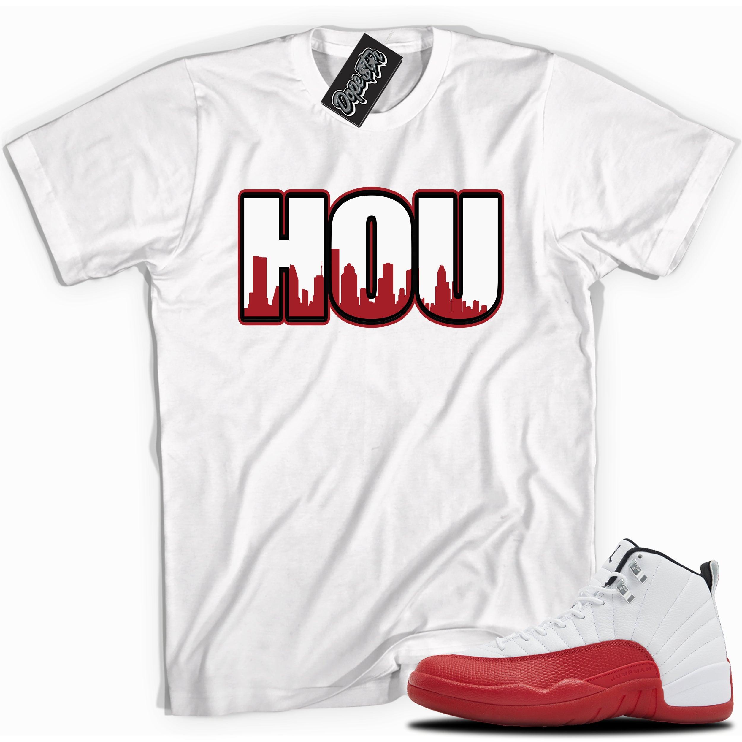 Cool White graphic tee with “ HOUSTON ” print, that perfectly matches Air Jordan 12 Retro Cherry Red 2023 red and white sneakers