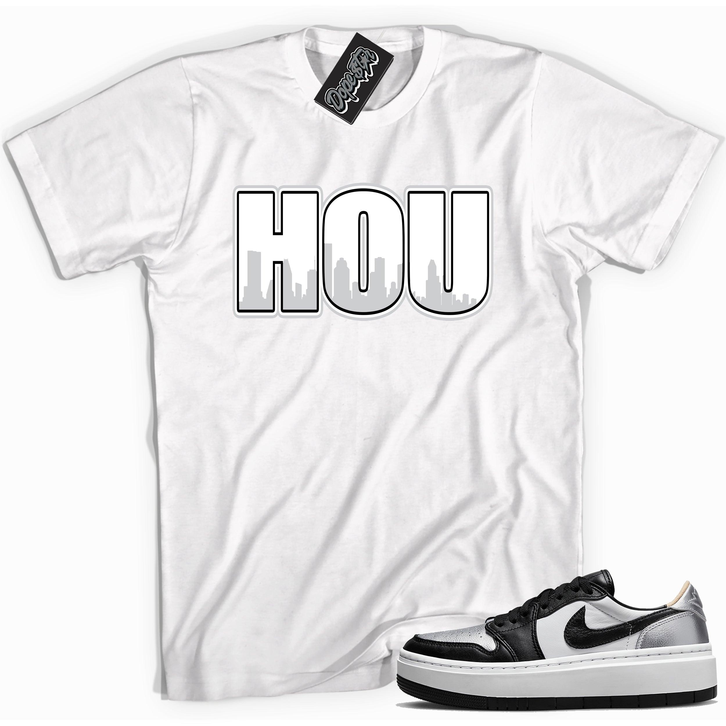 Cool white graphic tee with 'Houston HOU' print, that perfectly matches Air Jordan 1 Elevate Low SE Silver Toe sneakers.