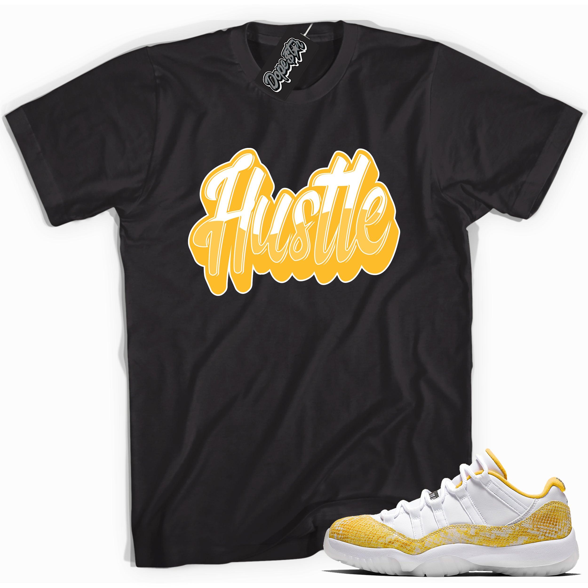 Cool black graphic tee with 'hustle' print, that perfectly matches  Air Jordan 11 Low Yellow Snakeskin sneakers