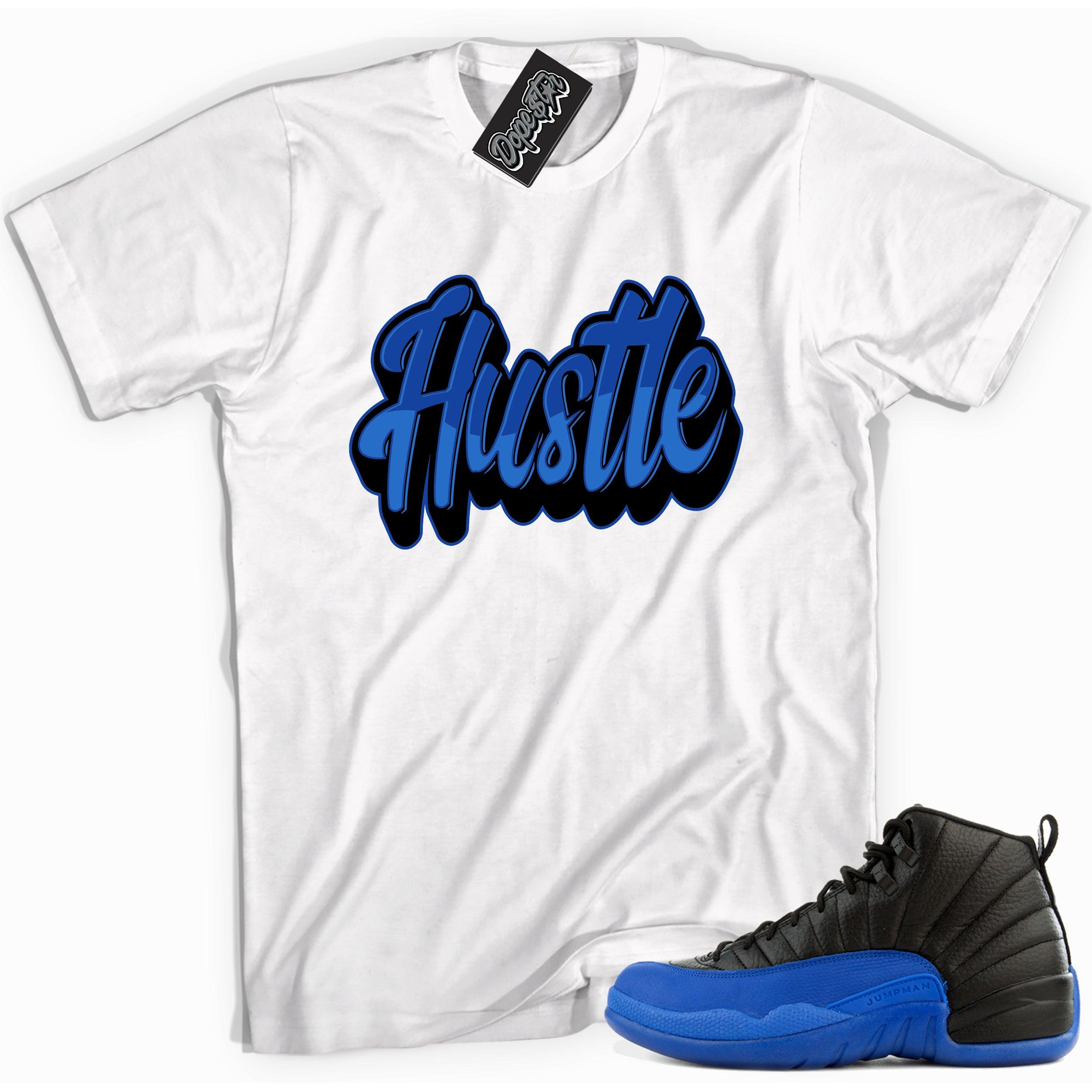 Cool white graphic tee with 'hustle' print, that perfectly matches Air Jordan 12 Retro Black Game Royal sneakers.