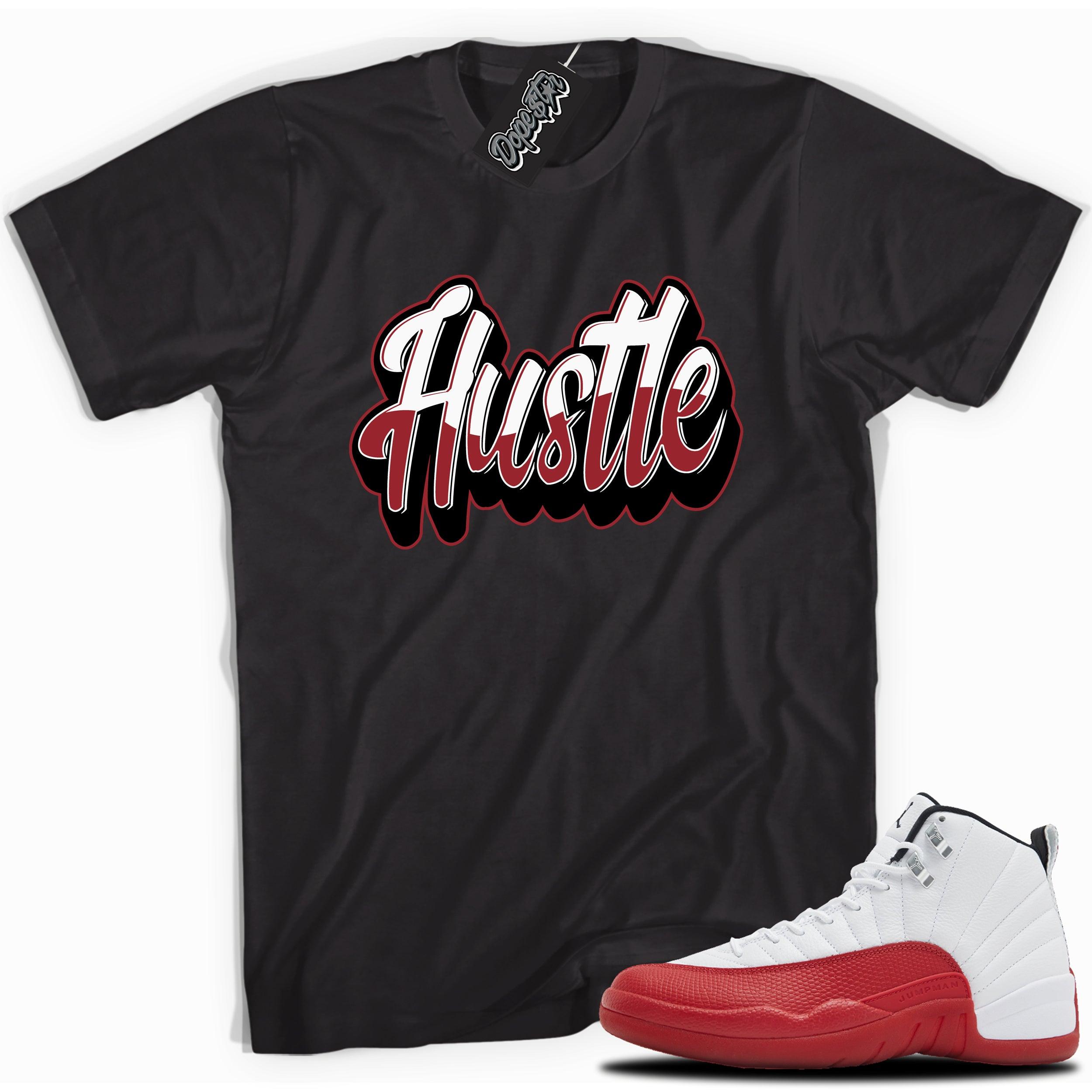 Cool Black graphic tee with “ HUSTLE 2 ” print, that perfectly matches Air Jordan 12 Retro Cherry Red 2023 red and white sneakers 