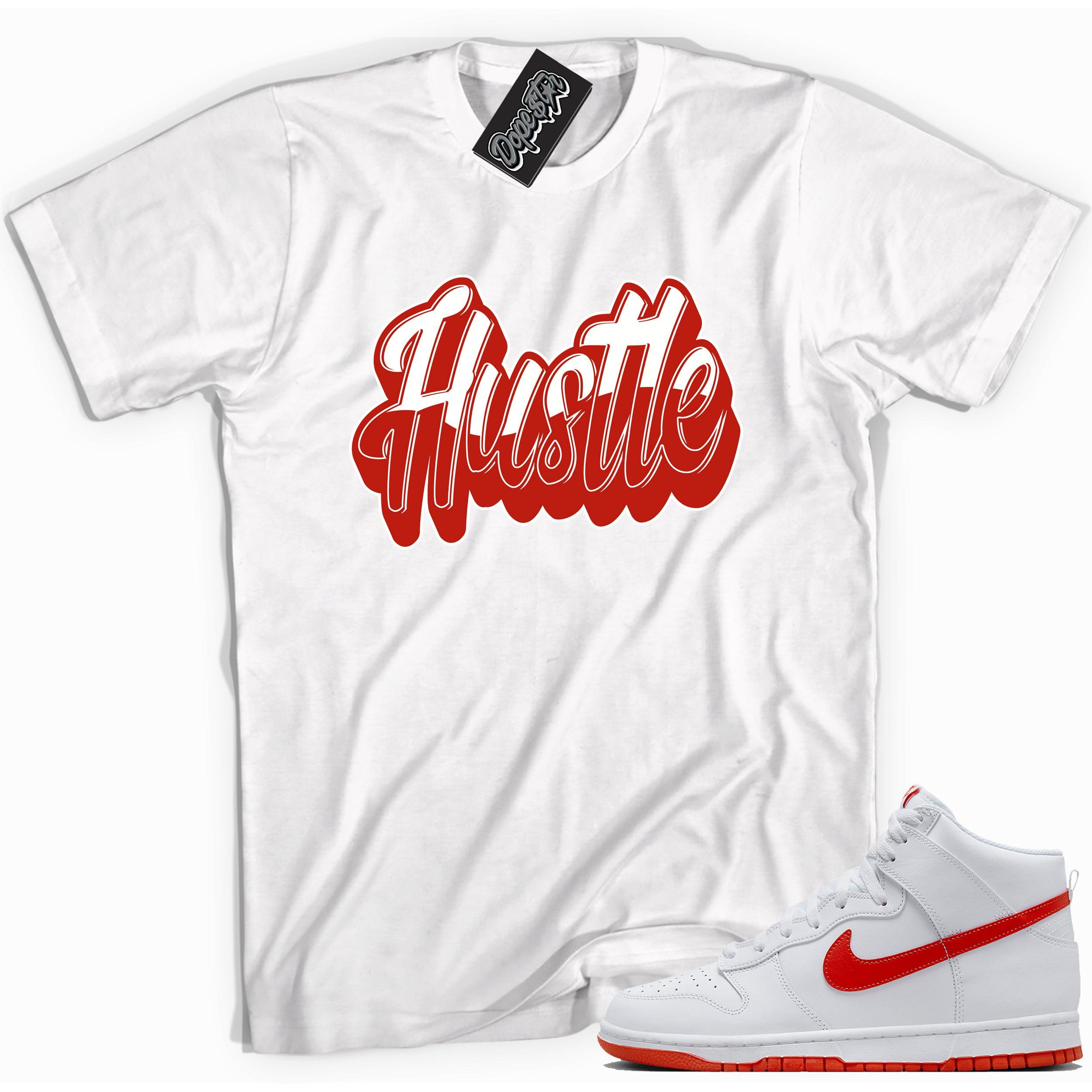 Cool white graphic tee with 'hustle' print, that perfectly matches Nike Dunk High White Picante Red sneakers.