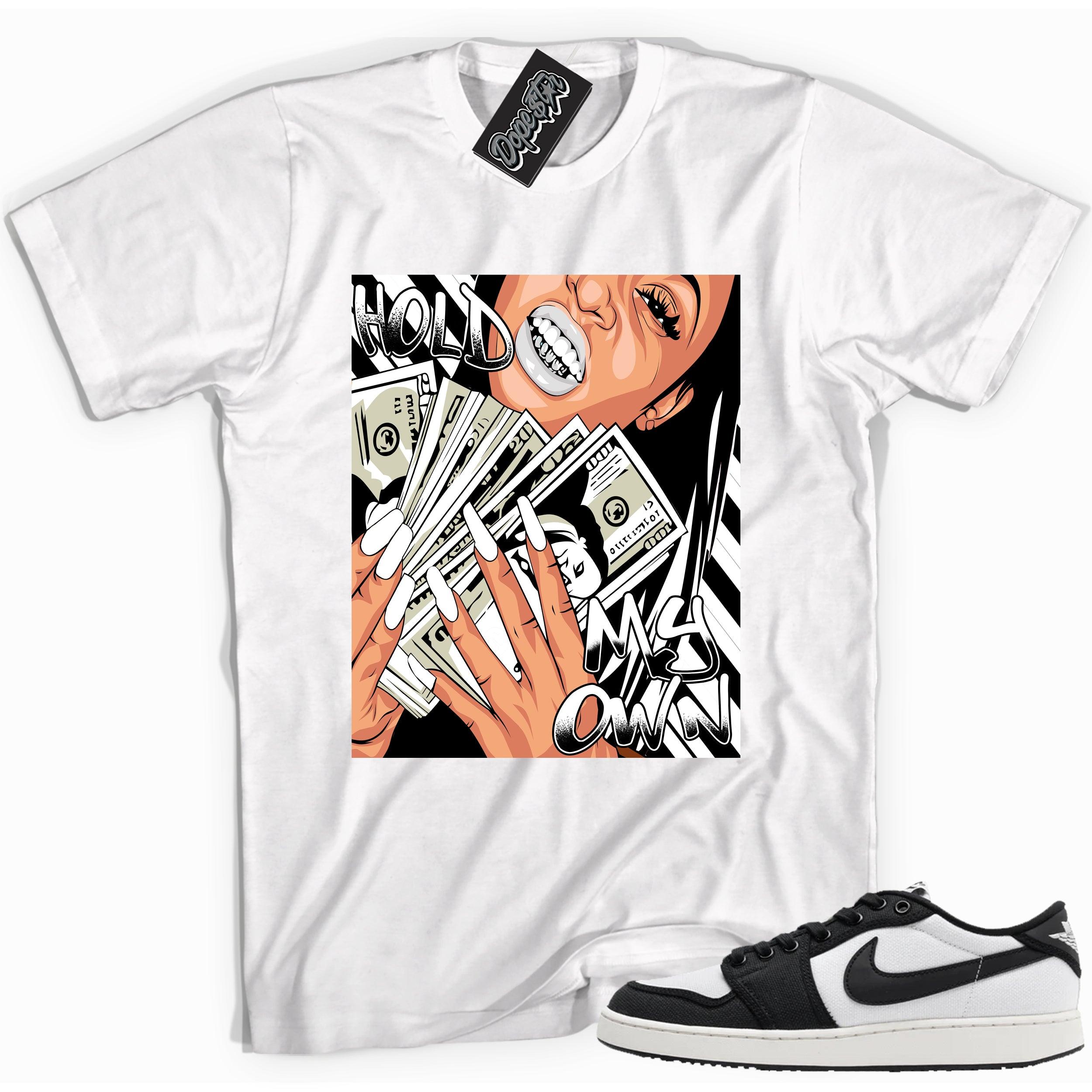Cool white graphic tee with 'hold my own' print, that perfectly matches Air Jordan 1 Retro Ajko Low Black & White sneakers.