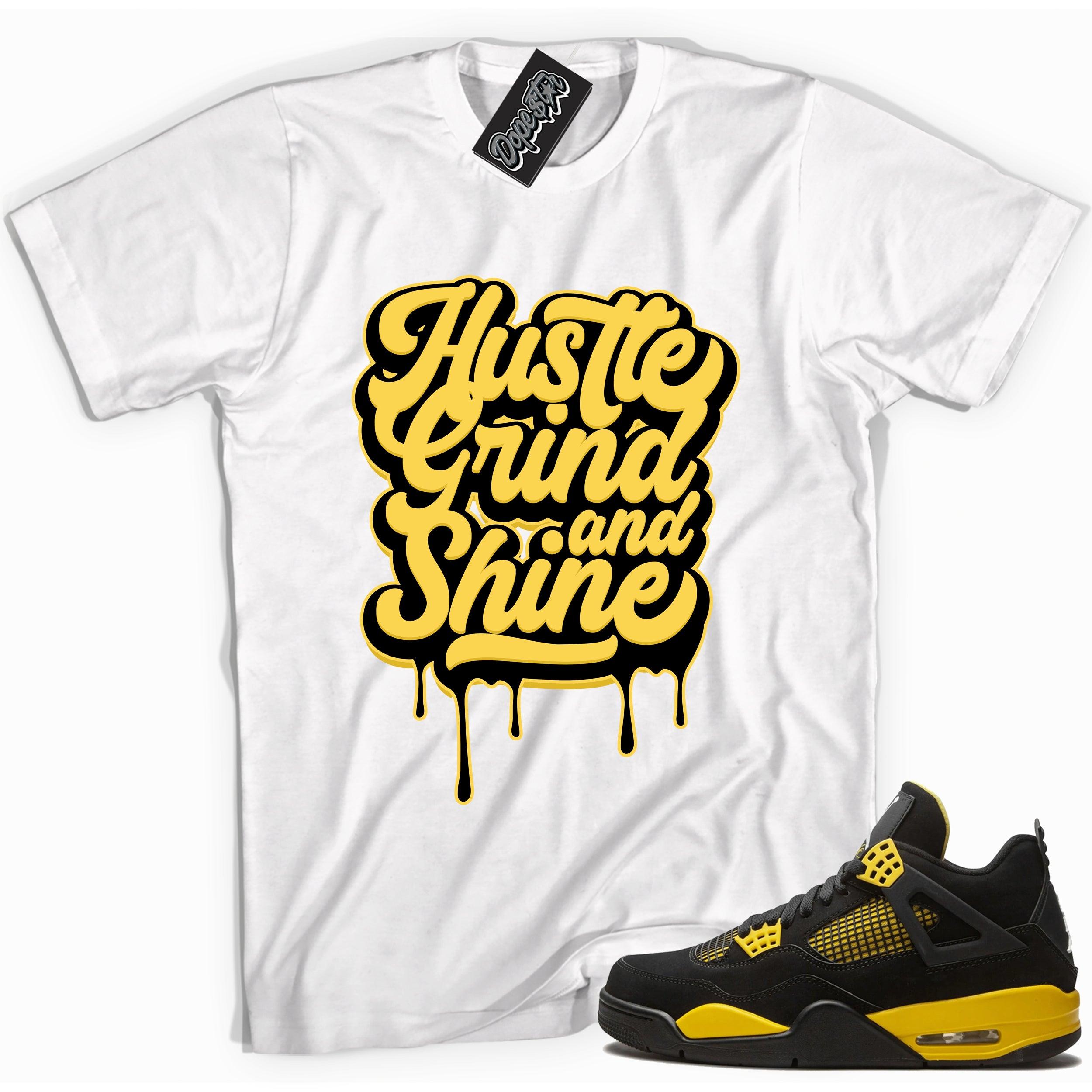 Cool white graphic tee with 'hustle grind & shine' print, that perfectly matches Air Jordan 4 Thunder sneakers