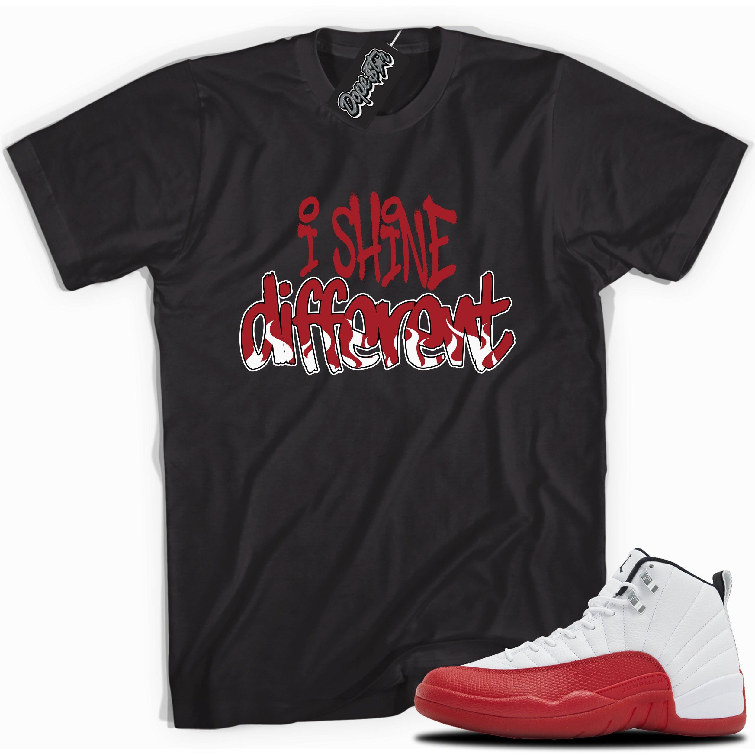 Cool Black graphic tee with “  I SHINE DIFFERENT  ” print, that perfectly matches Air Jordan 12 Retro Cherry Red 2023 red and white sneakers 