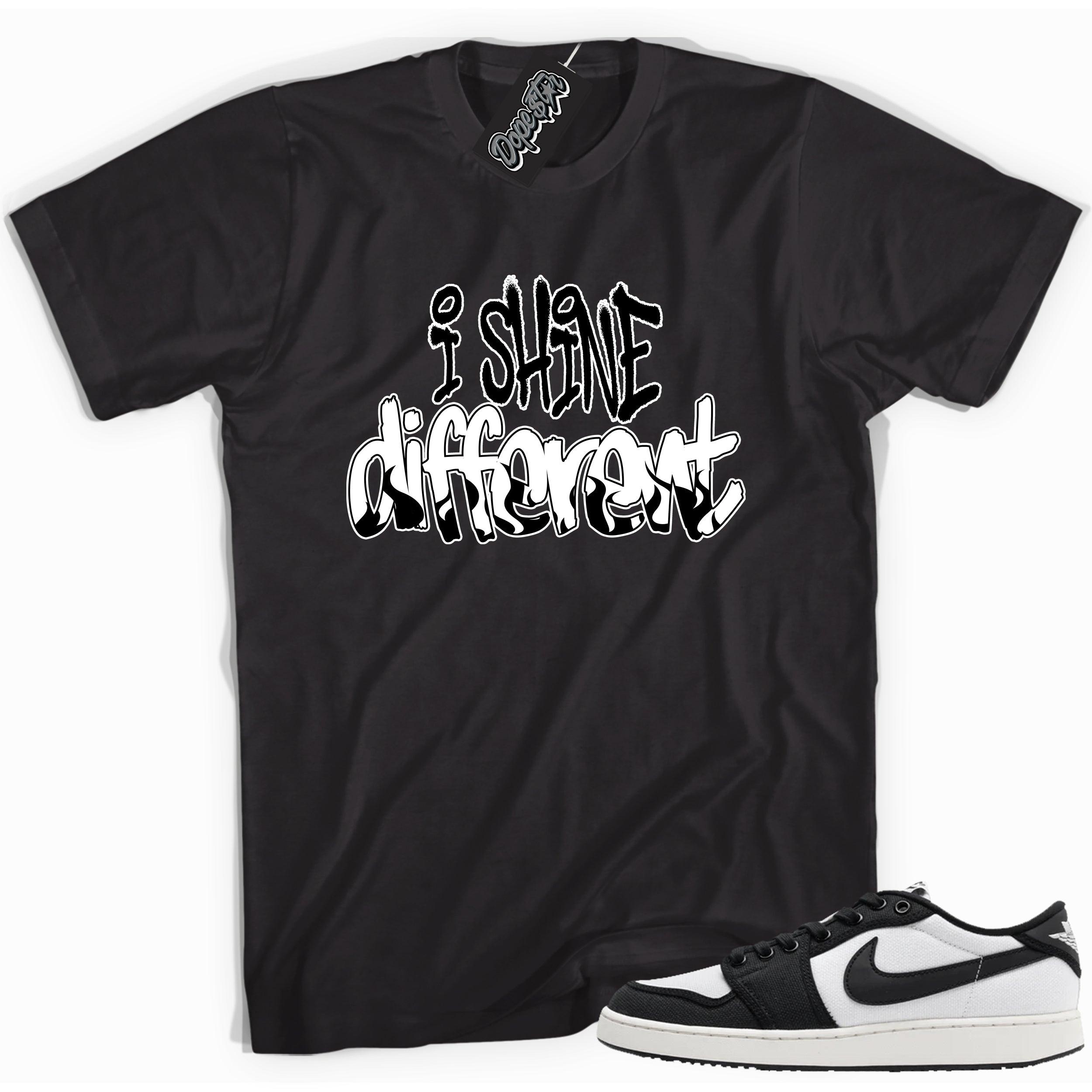 Cool black graphic tee with 'i shine different' print, that perfectly matches Air Jordan 1 Retro Ajko Low Black & White sneakers.
