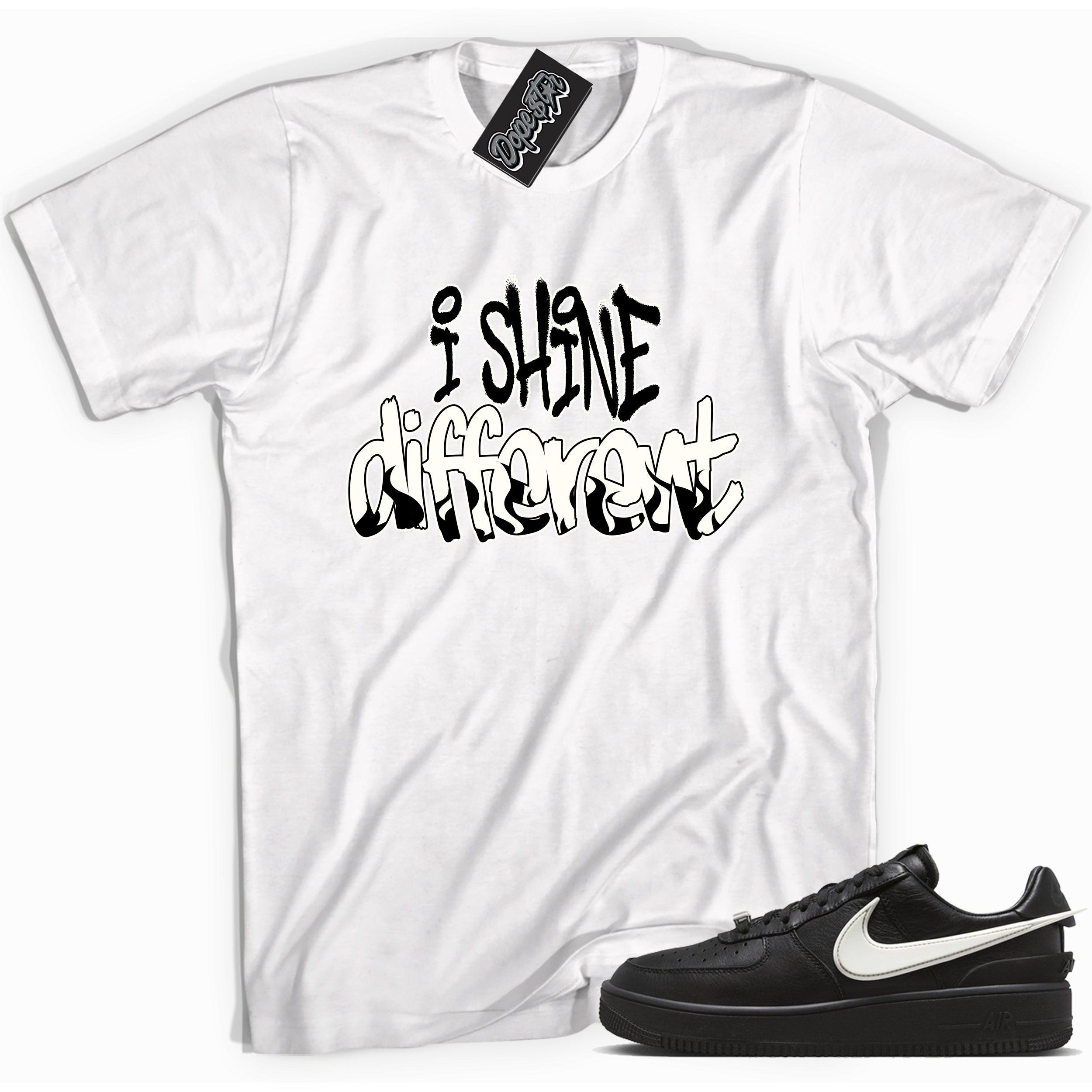 Cool white graphic tee with 'i shine different' print, that perfectly matches Nike Air Force 1 Low Ambush Phantom Black sneakers