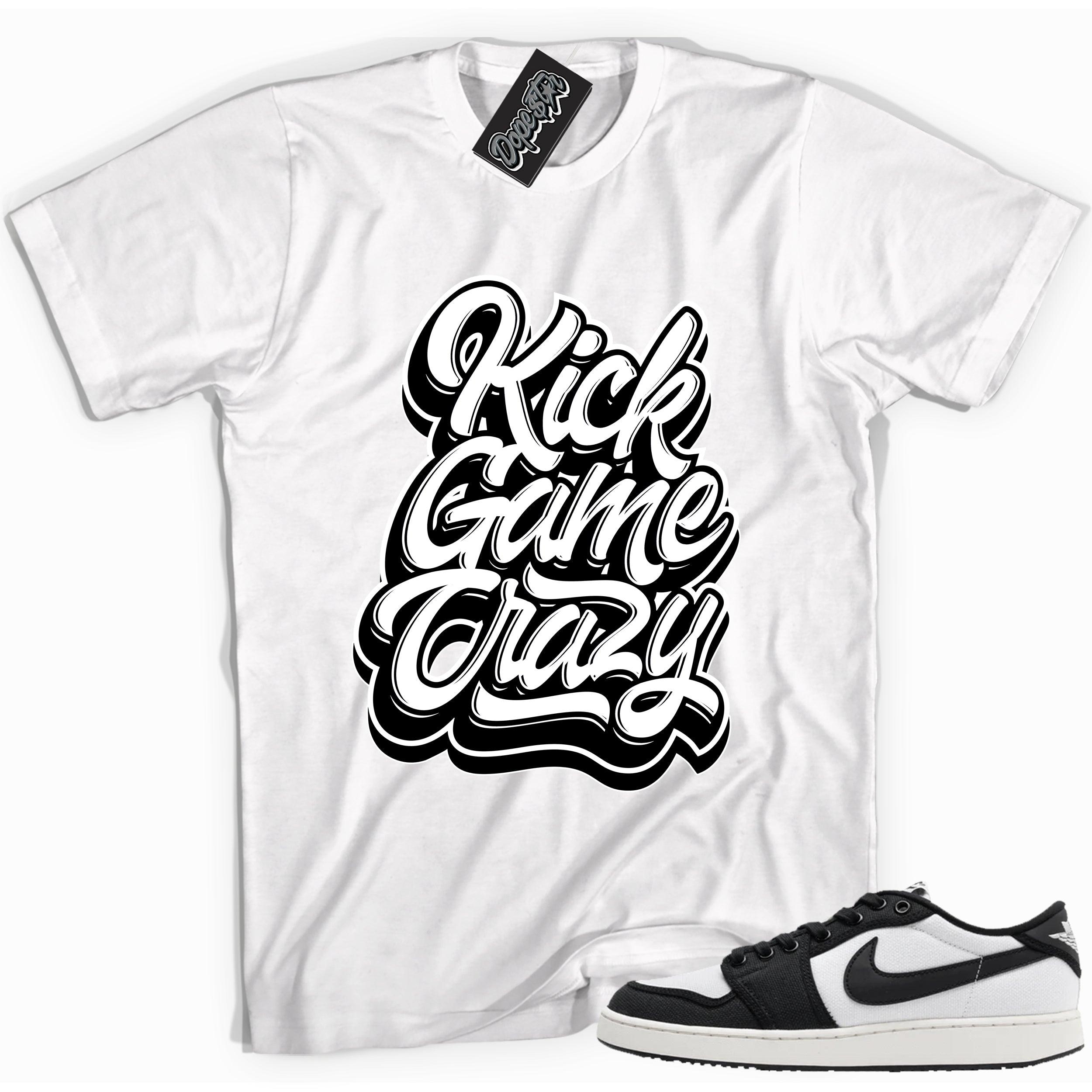 Cool white graphic tee with 'kick game crazy' print, that perfectly matches Air Jordan 1 Retro Ajko Low Black & White sneakers.