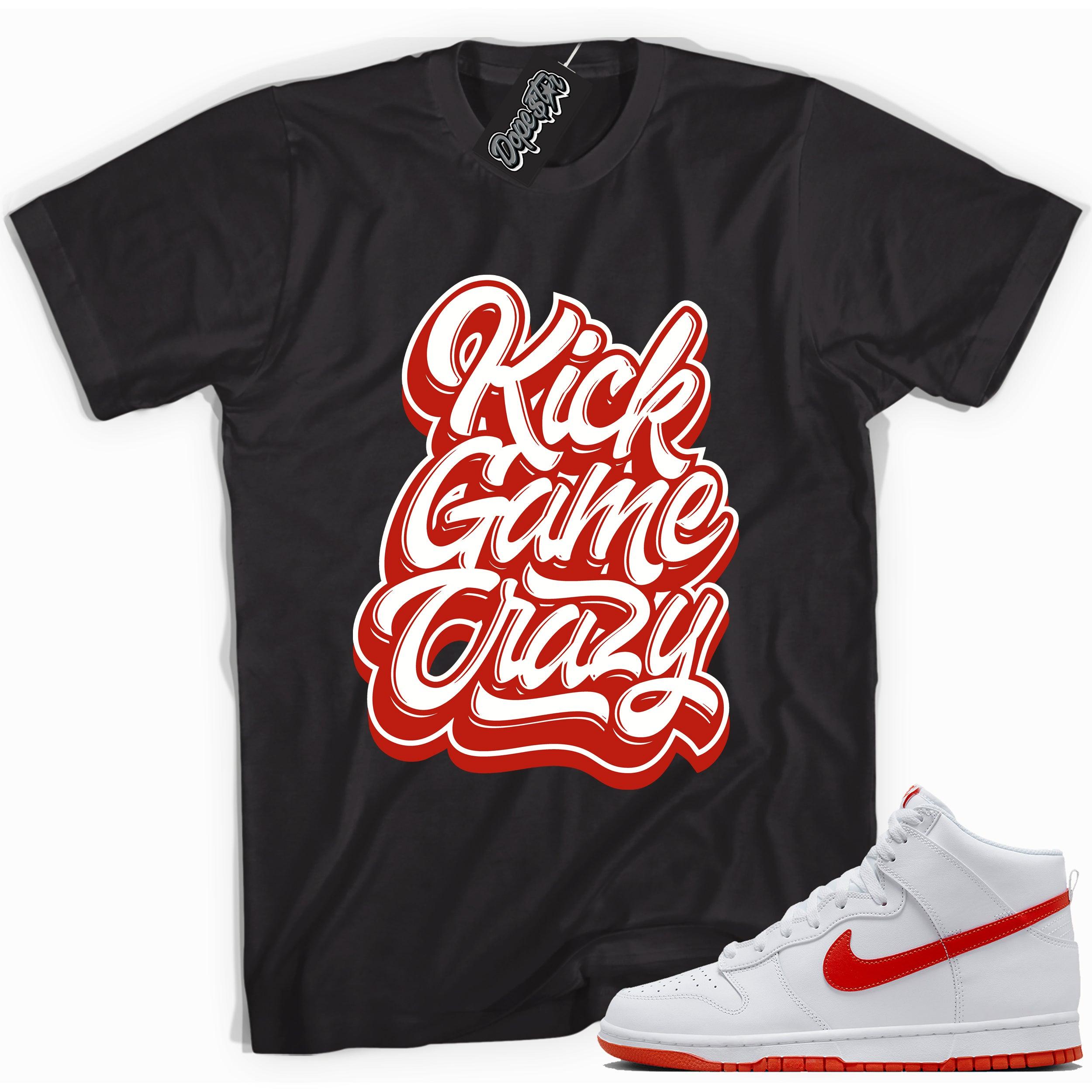Cool black graphic tee with 'kick game crazy' print, that perfectly matches Nike Dunk High White Picante Red sneakers.