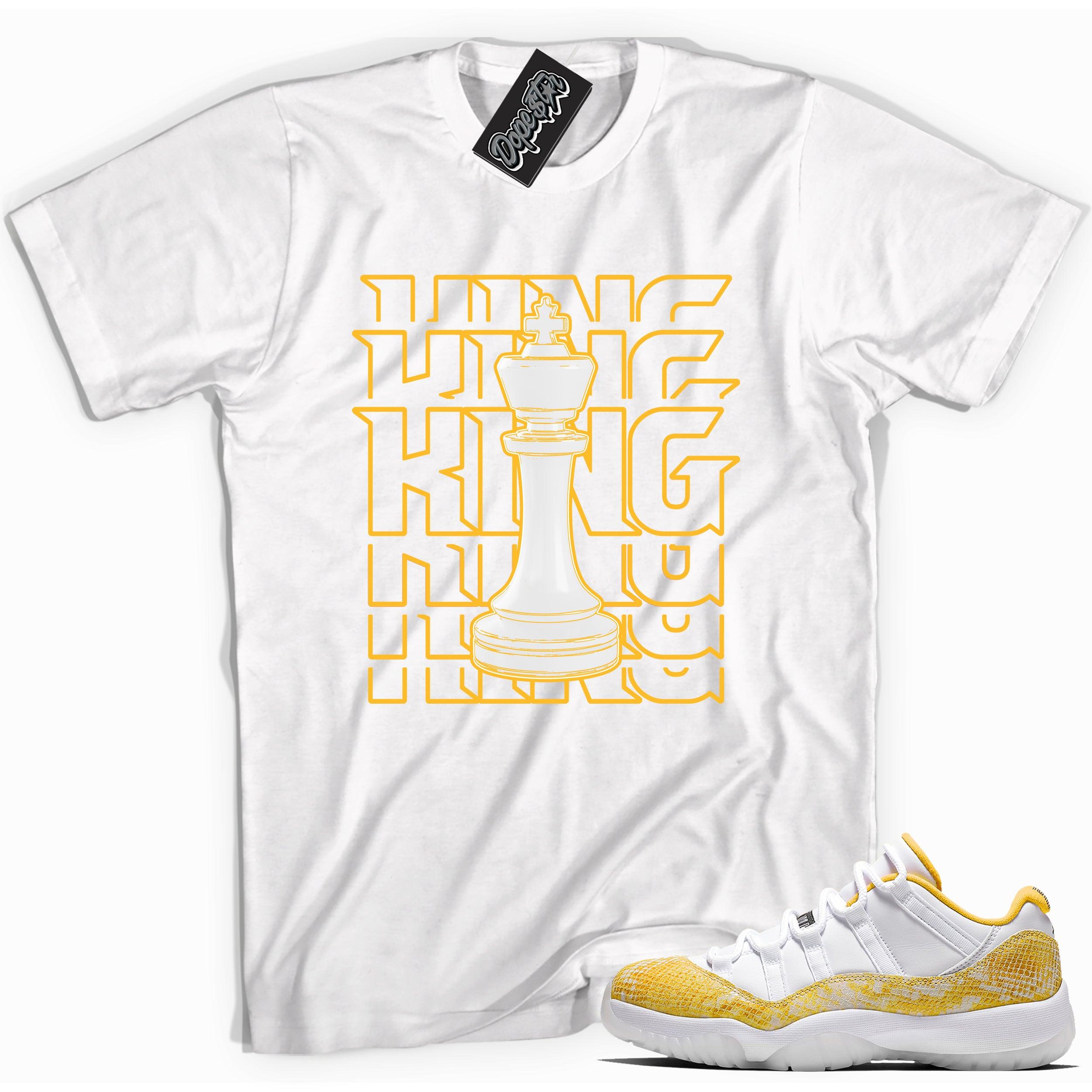 Cool white graphic tee with 'King' print, that perfectly matches  Air Jordan 11 Low Yellow Snakeskin sneakers