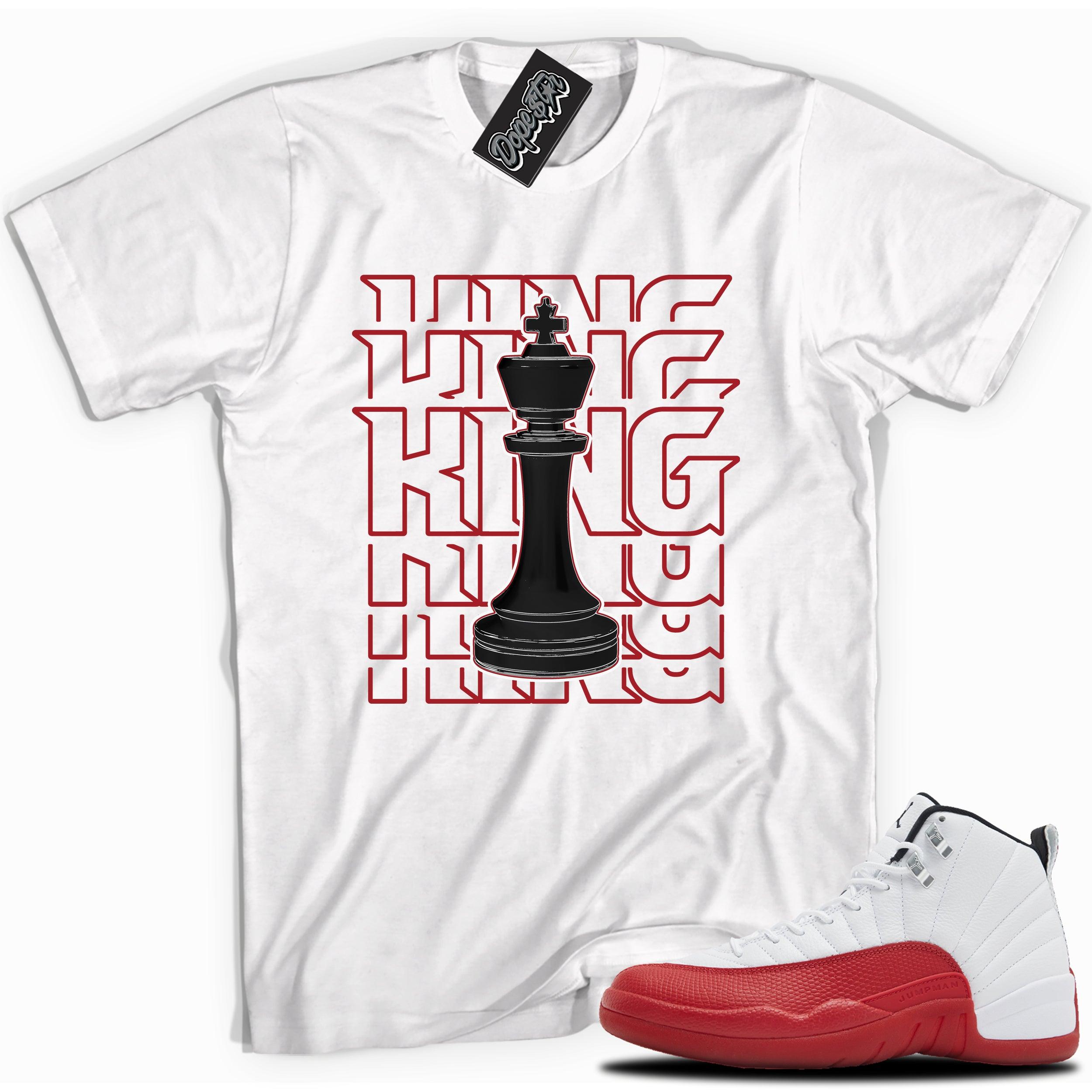 Cool White graphic tee with “  KING CHESS ” print, that perfectly matches Air Jordan 12 Retro Cherry Red 2023 red and white sneakers 