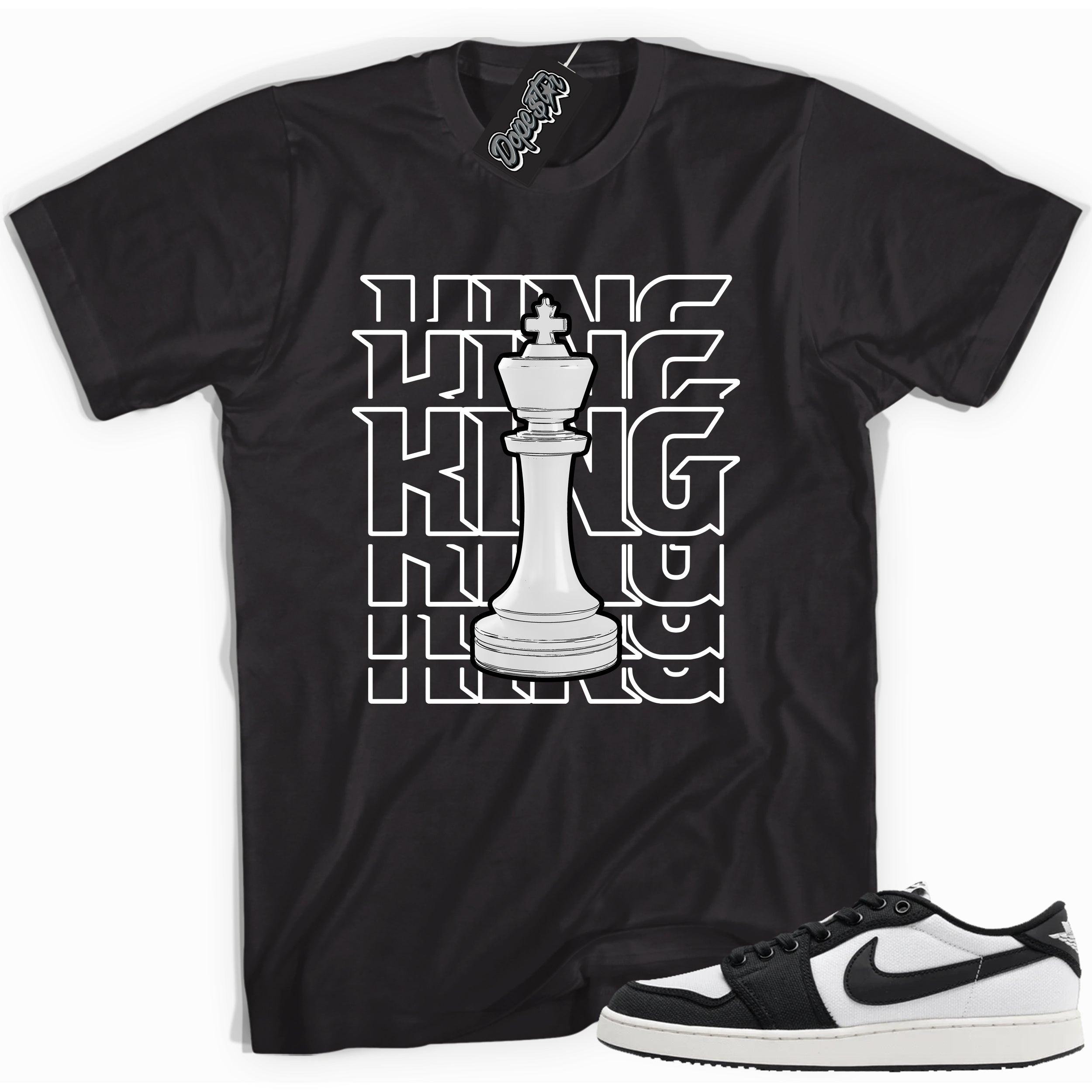 Cool black graphic tee with 'king' print, that perfectly matches Air Jordan 1 Retro Ajko Low Black & White sneakers.