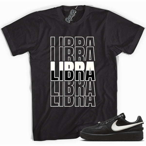 Cool black graphic tee with 'libra' print, that perfectly matches Nike Air Force 1 Low SP Ambush Phantom sneakers.