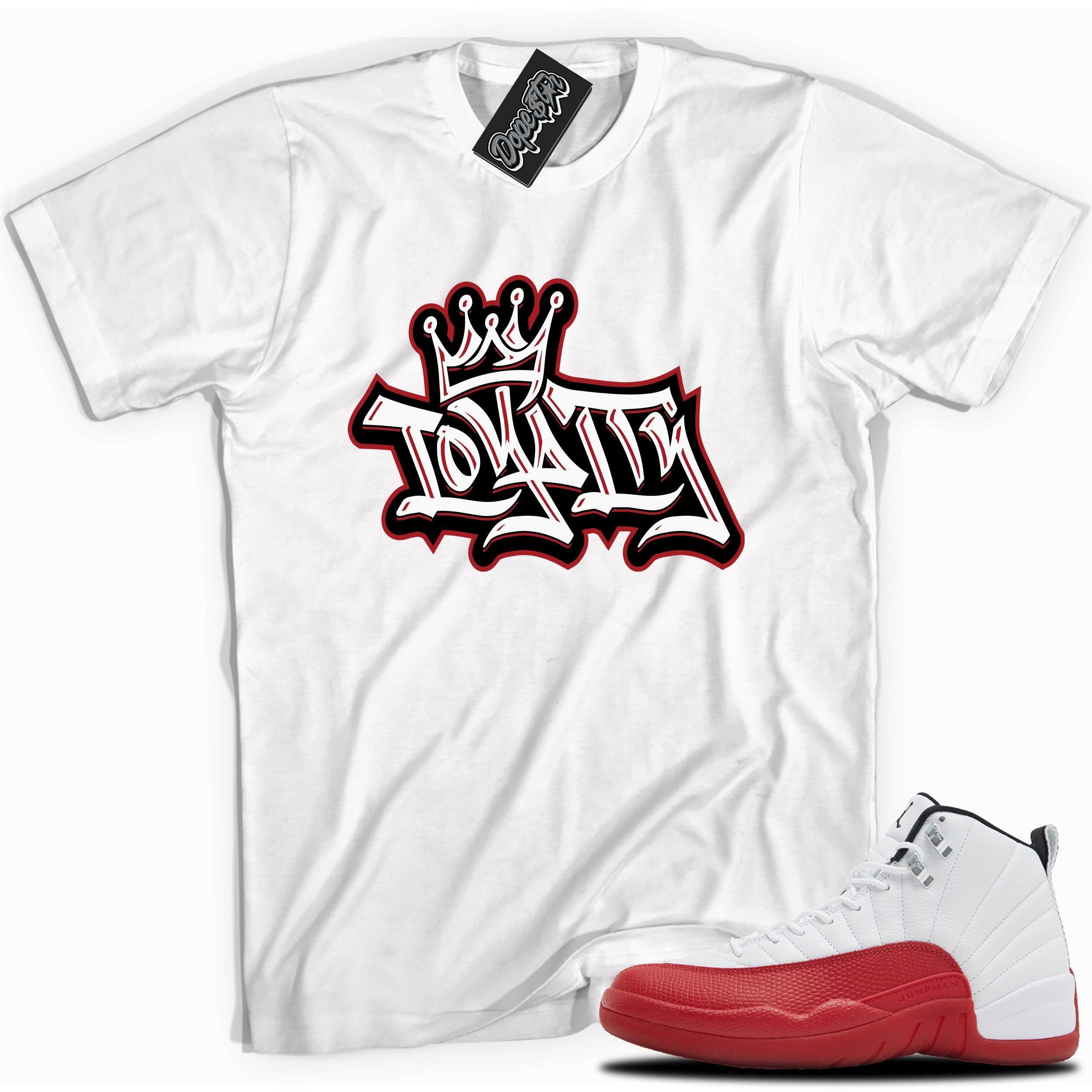 Cool White graphic tee with “  Loyalty Crown ” print, that perfectly matches Air Jordan 12 Retro Cherry Red 2023 red and white sneakers 