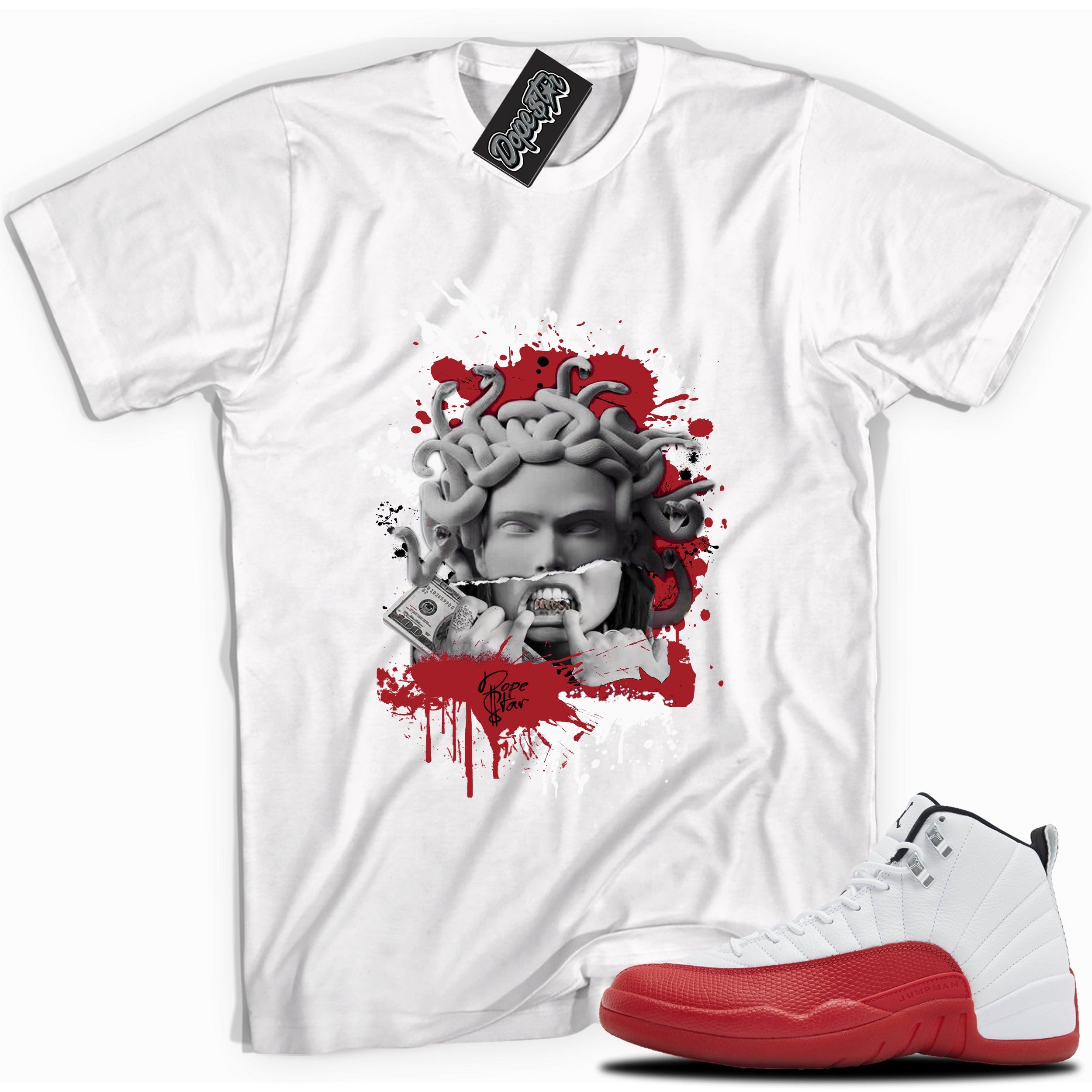 Cool White graphic tee with “ MEDUSA ” print, that perfectly matches Air Jordan 12 Retro Cherry Red 2023 red and white sneakers 