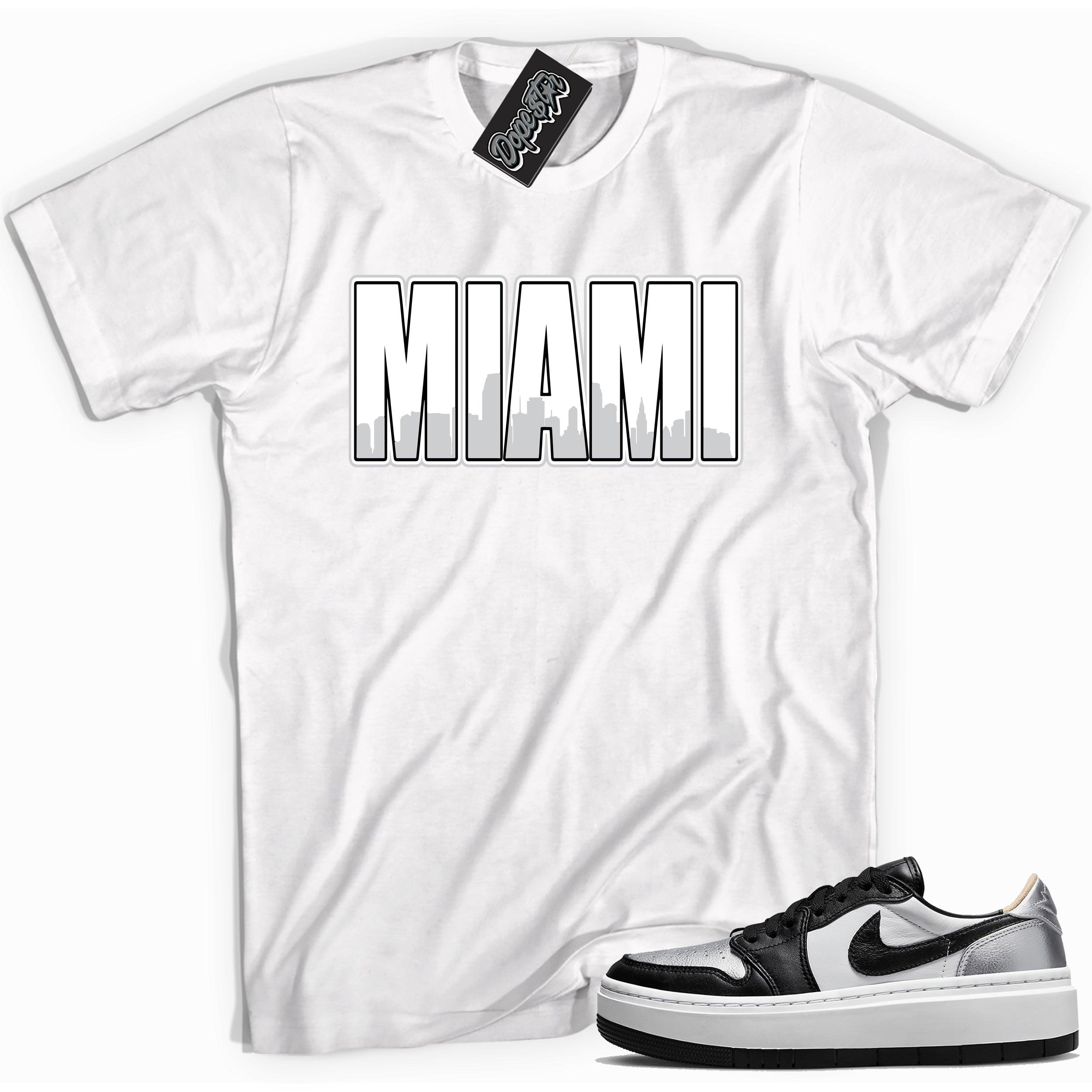 Cool white graphic tee with 'miami' print, that perfectly matches Air Jordan 1 Elevate Low SE Silver Toe sneakers.