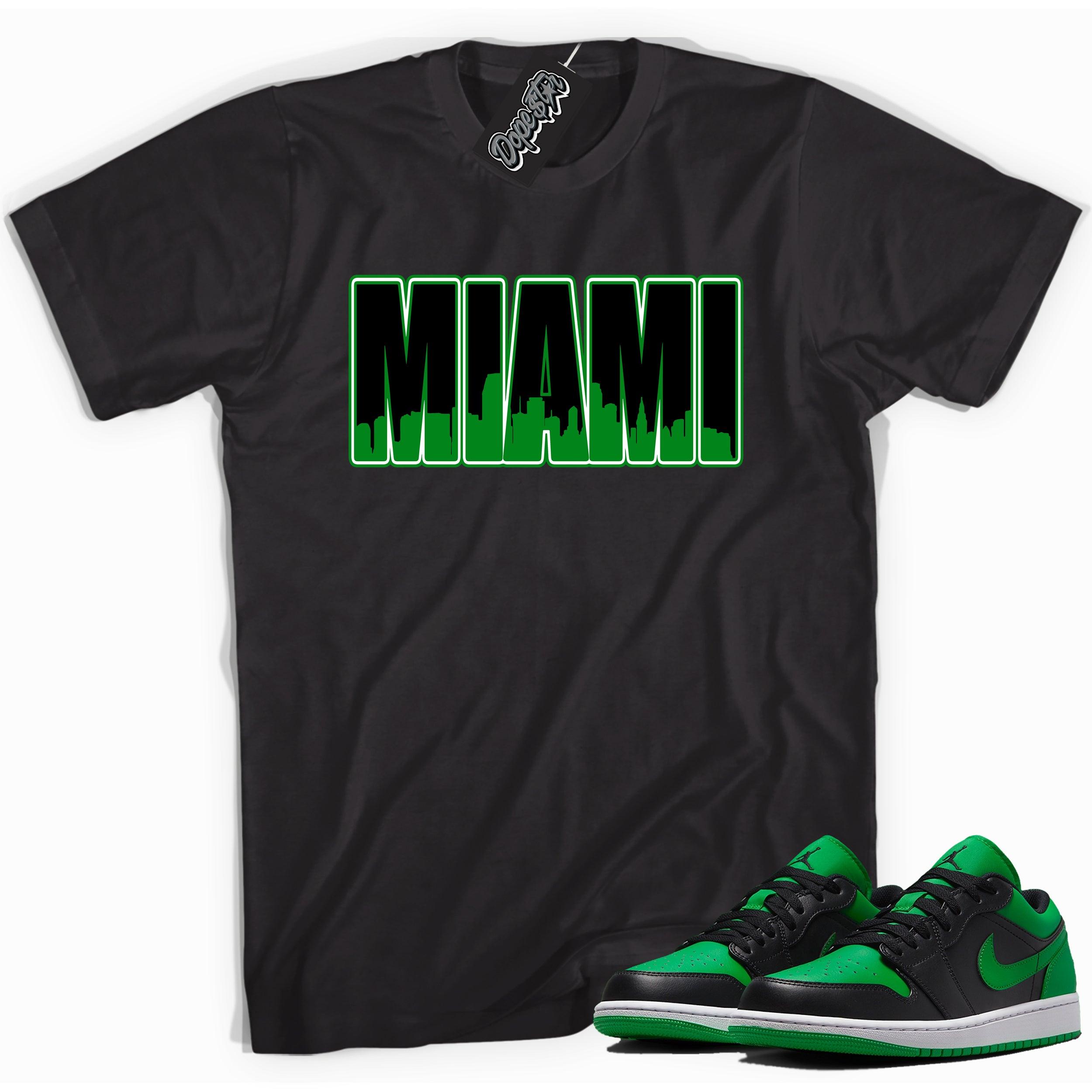 Cool black graphic tee with 'miami' print, that perfectly matches Air Jordan 1 Low Lucky Green sneakers