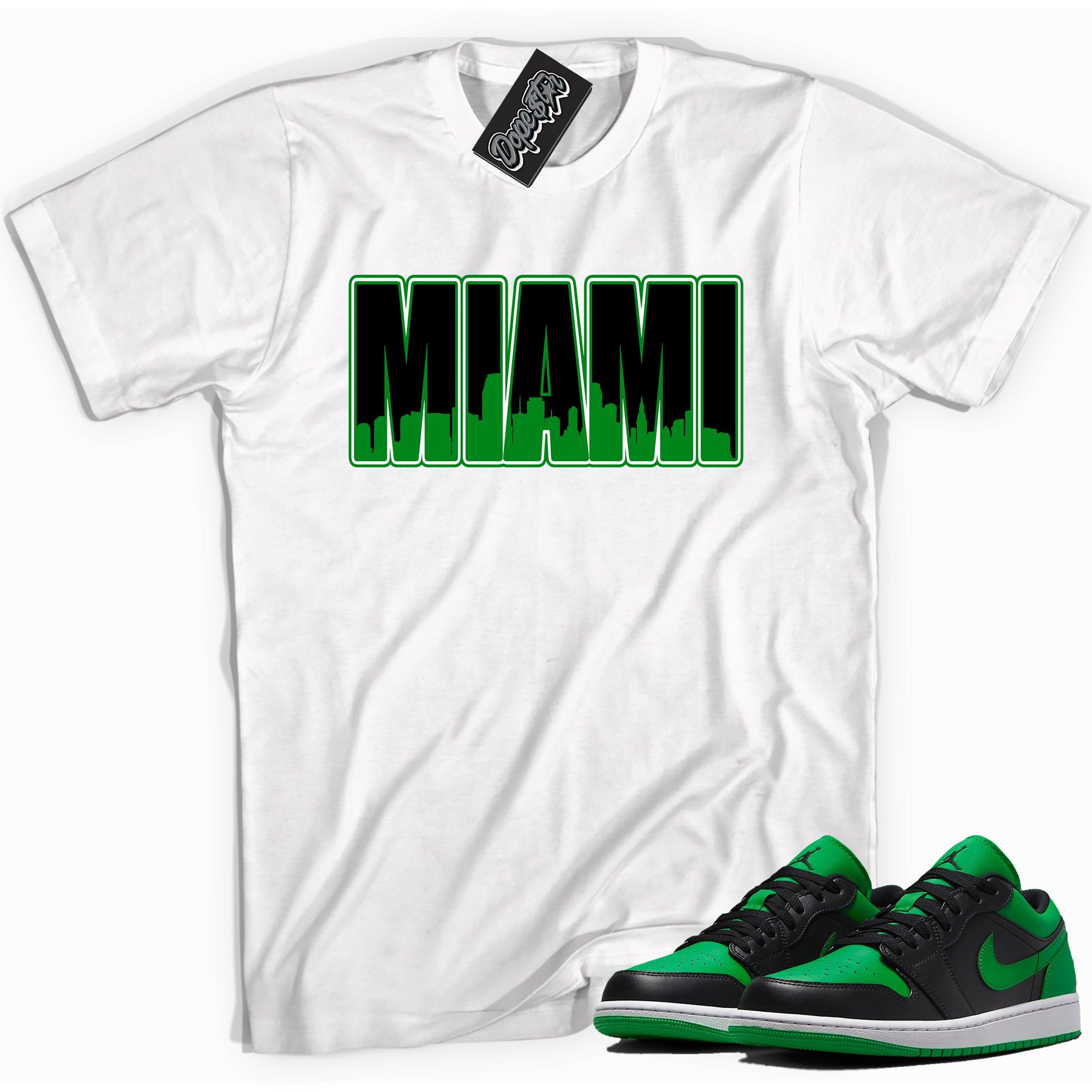 Cool white graphic tee with 'miami' print, that perfectly matches Air Jordan 1 Low Lucky Green sneakers