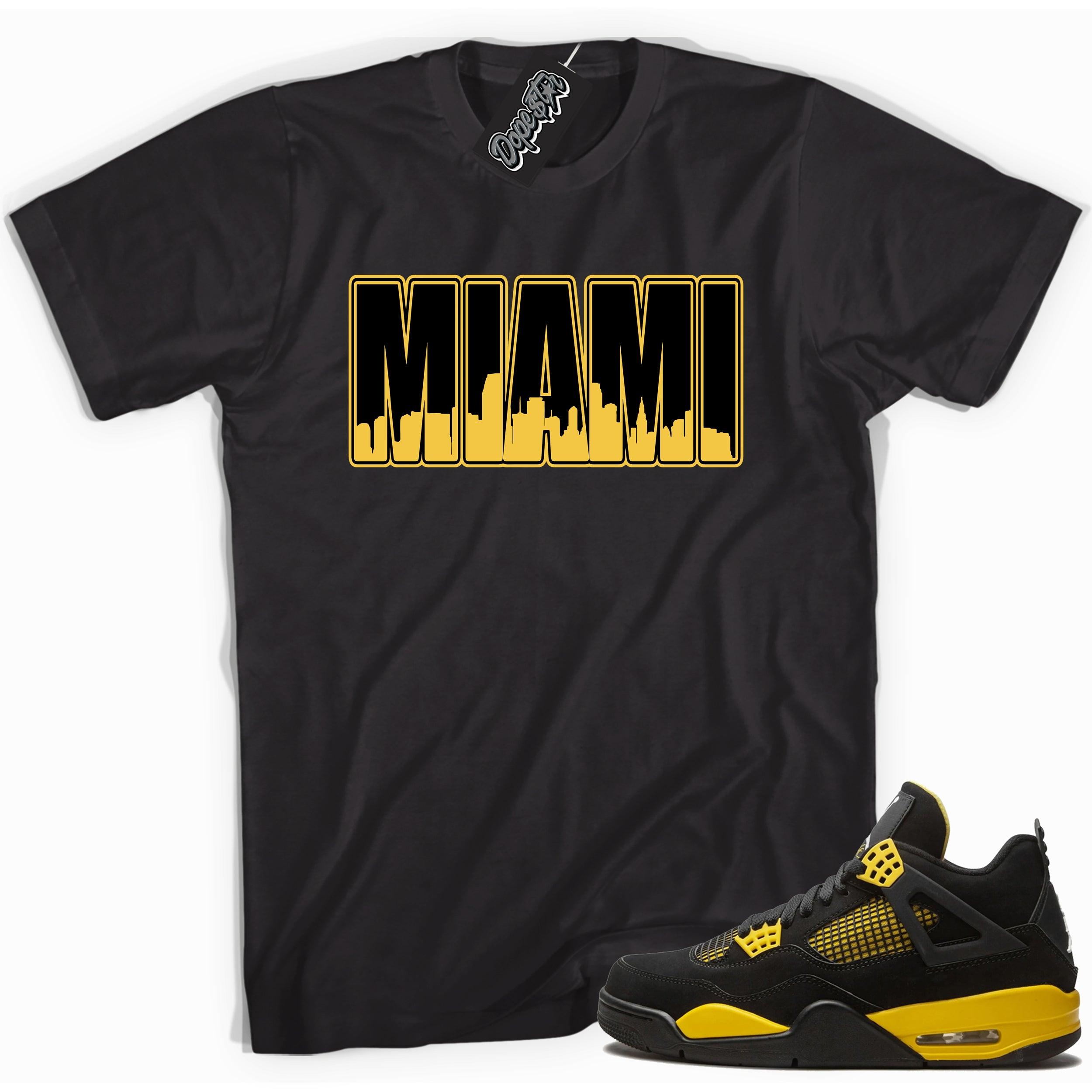 Cool black graphic tee with 'miami' print, that perfectly matches Air Jordan 4 Thunder sneakers