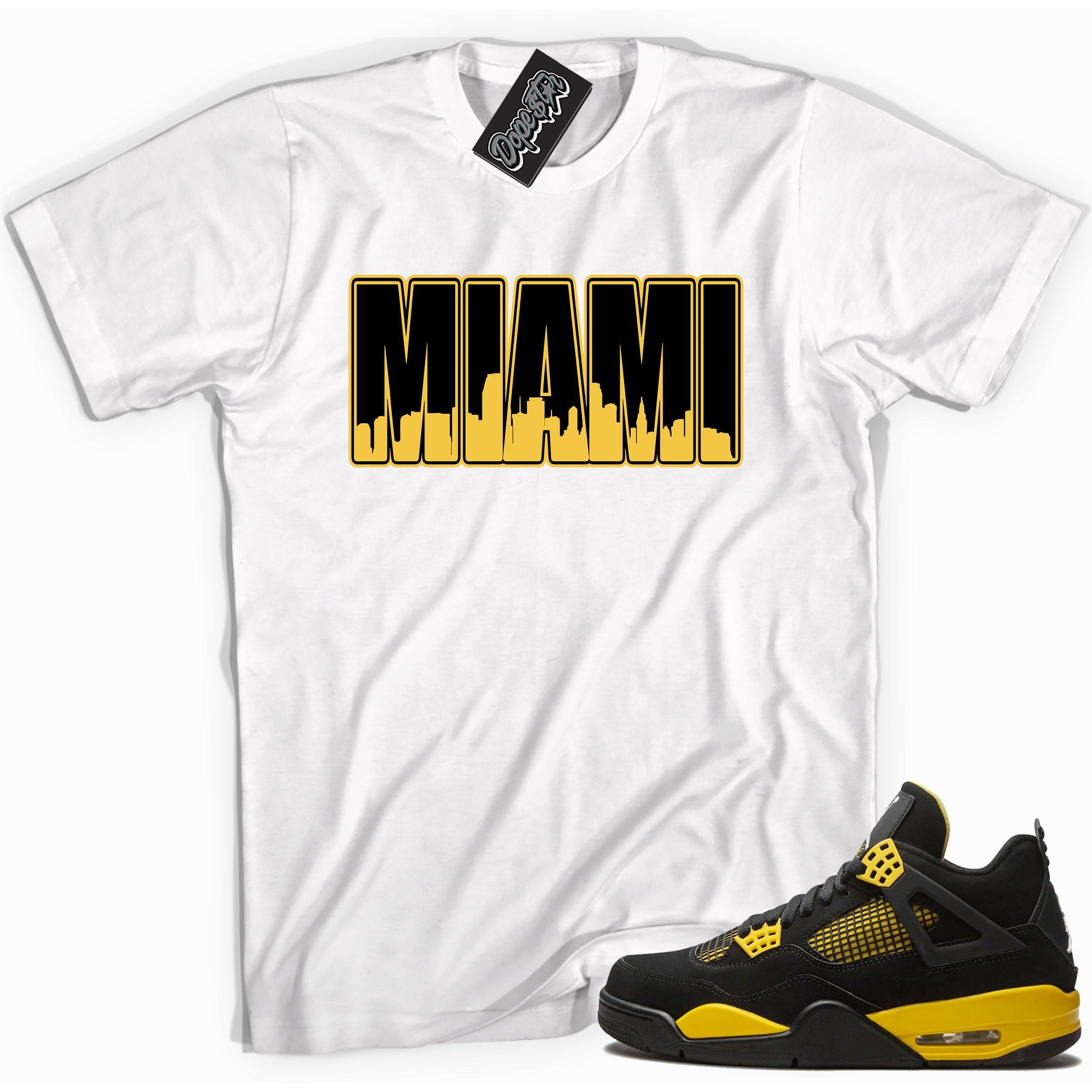 Cool white graphic tee with 'miami' print, that perfectly matches Air Jordan 4 Thunder sneakers