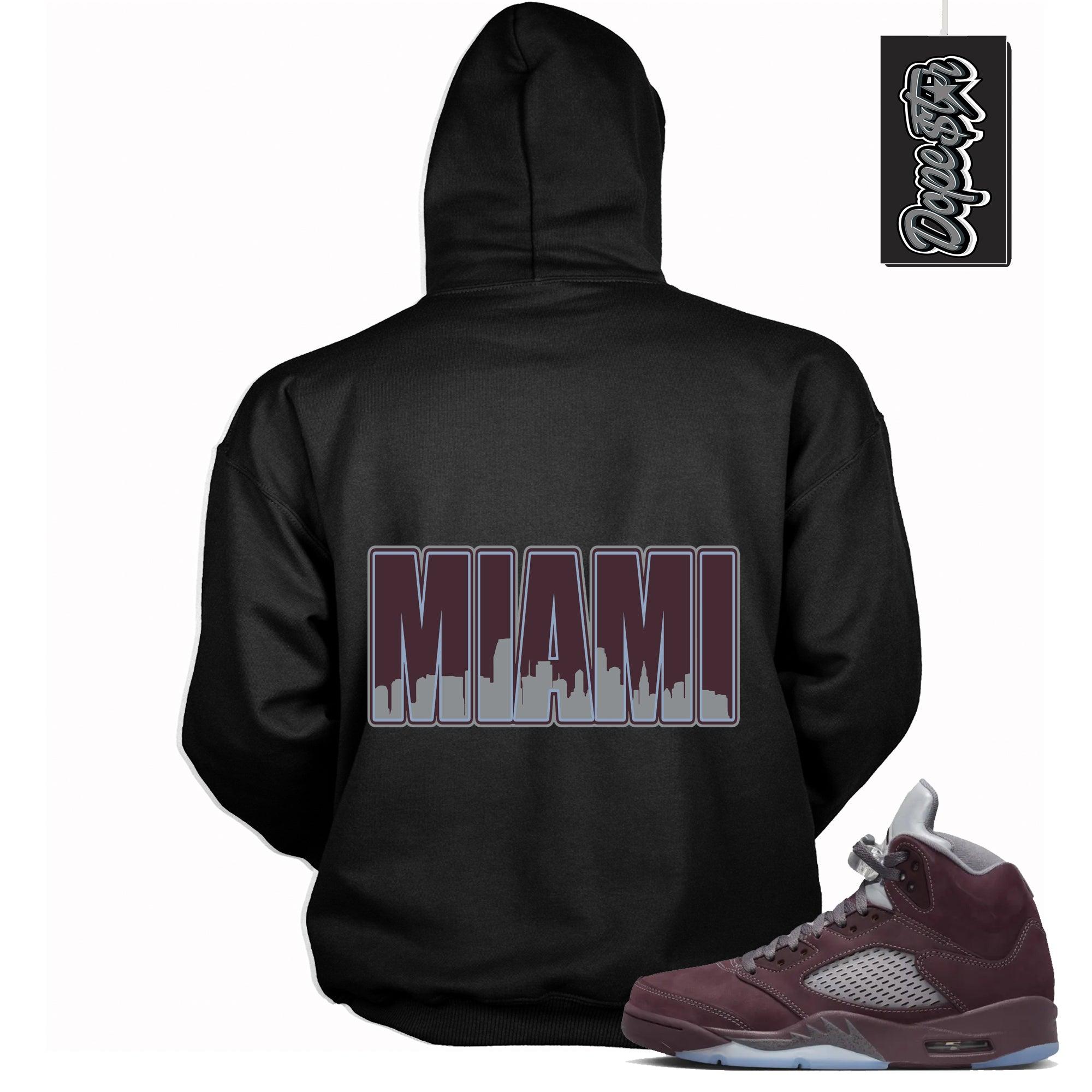 Cool Black Graphic Hoodie with “ MIAMI  “ print, that perfectly matches Air Jordan 5 Burgundy 2023 sneakers