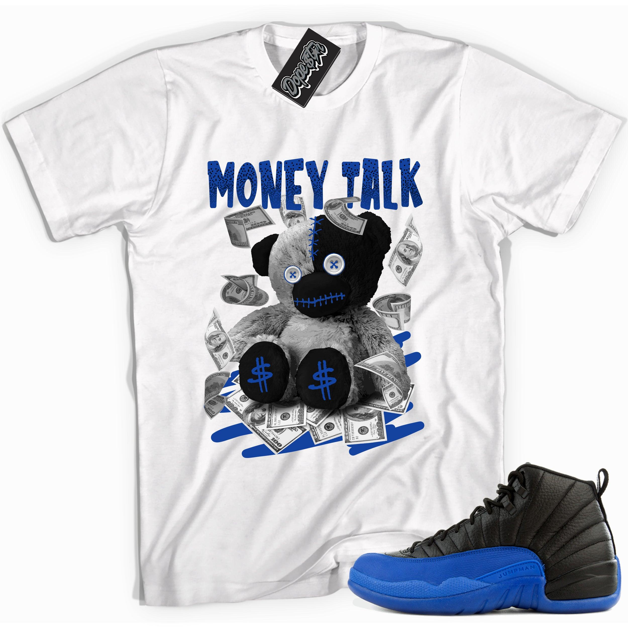 Cool white graphic tee with 'money talk bear' print, that perfectly matches Air Jordan 12 Retro Black Game Royal sneakers.