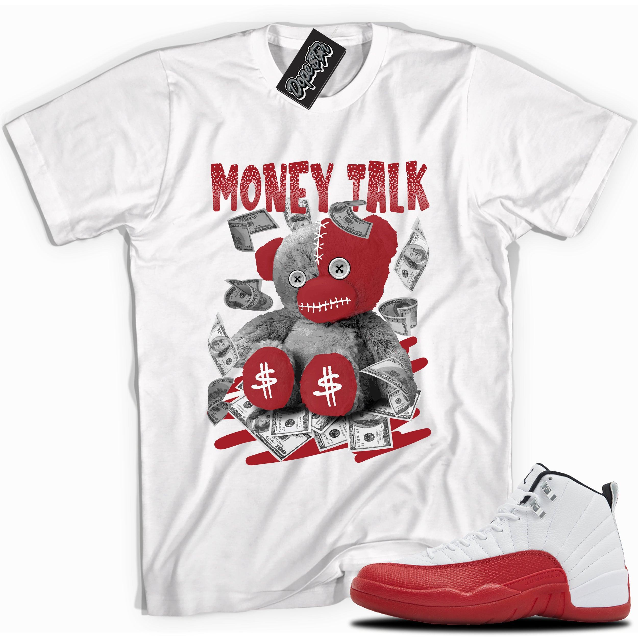 Cool White graphic tee with “  MONEY TALK BEAR  ” print, that perfectly matches Air Jordan 12 Retro Cherry Red 2023 red and white sneakers 