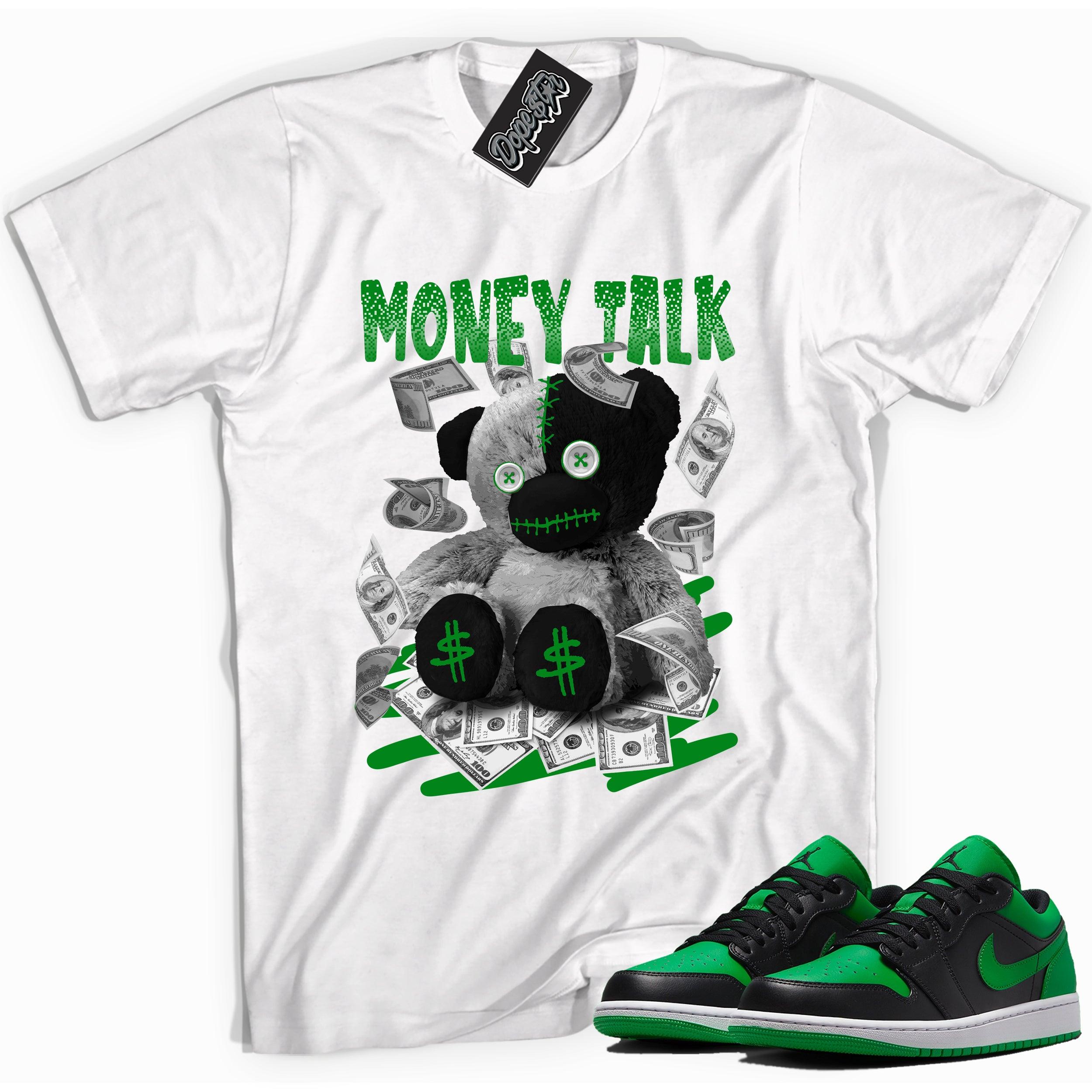 Cool white graphic tee with 'money talk bear' print, that perfectly matches Air Jordan 1 Low Lucky Green sneakers