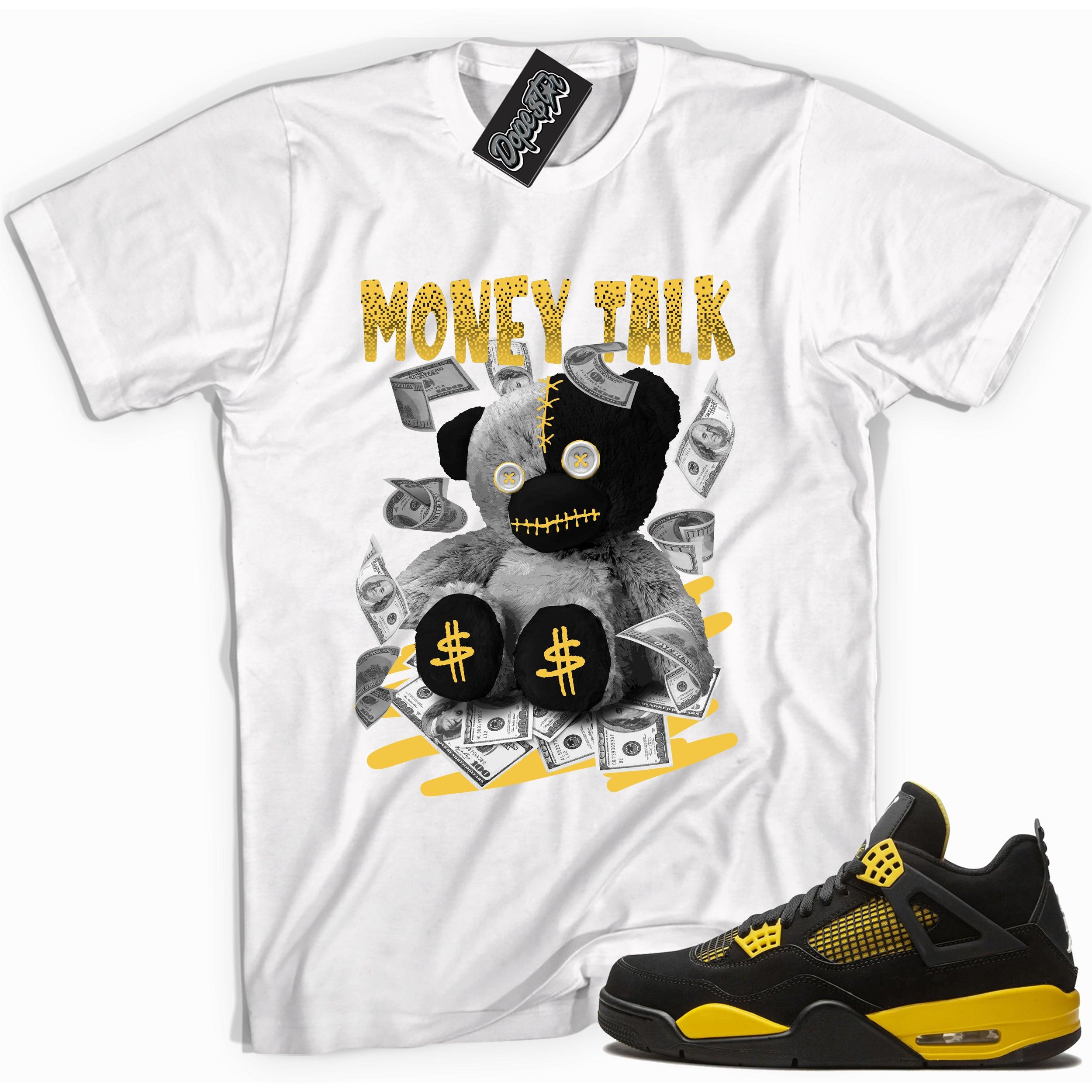 Cool white graphic tee with 'money talk bear' print, that perfectly matches Air Jordan 4 Thunder sneakers
