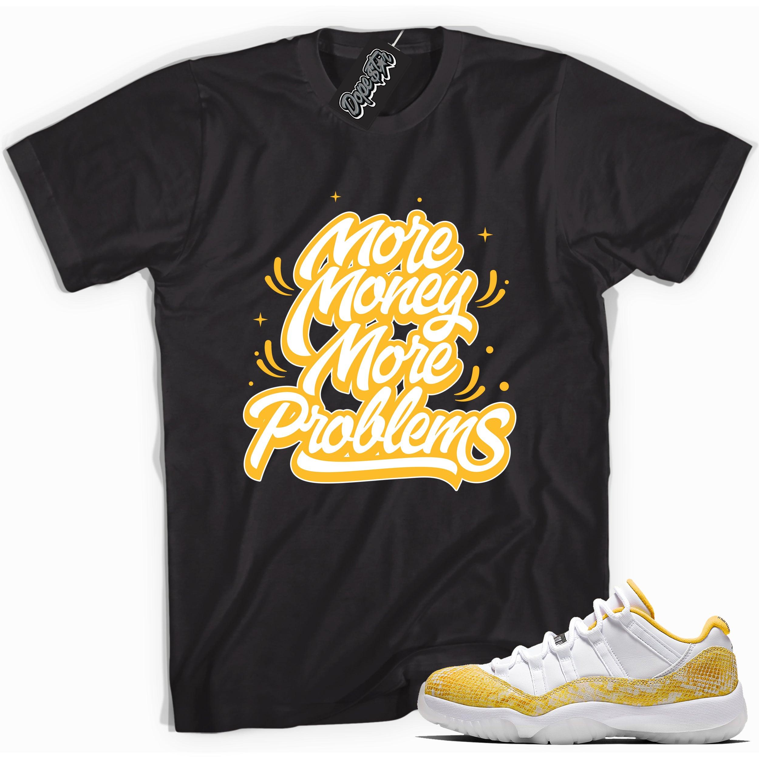 Cool black graphic tee with 'more money more problems' print, that perfectly matches  Air Jordan 11 Low Yellow Snakeskin sneakers