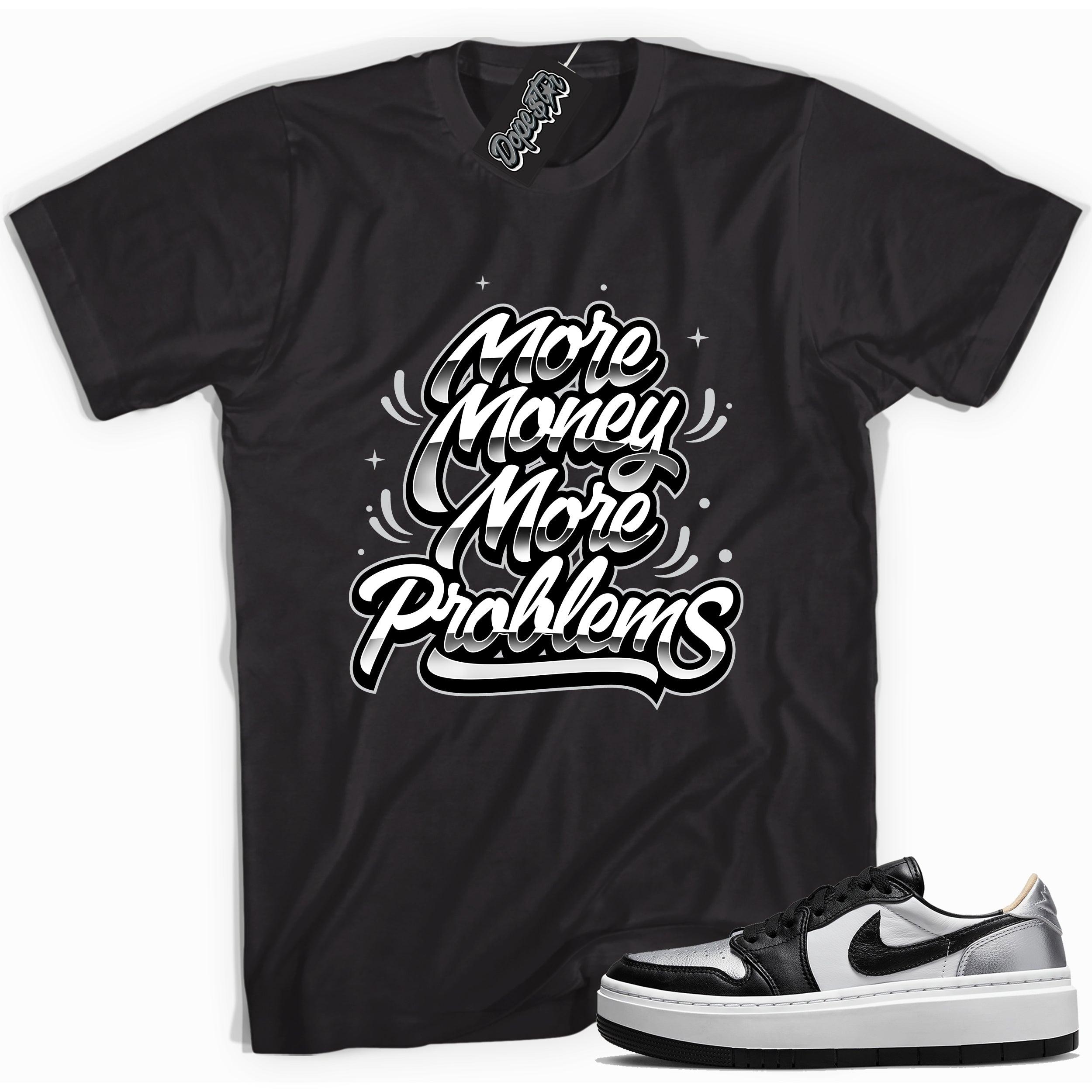Cool black graphic tee with 'more money more problems' print, that perfectly matches Air Jordan 1 Elevate Low SE Silver Toe sneakers.