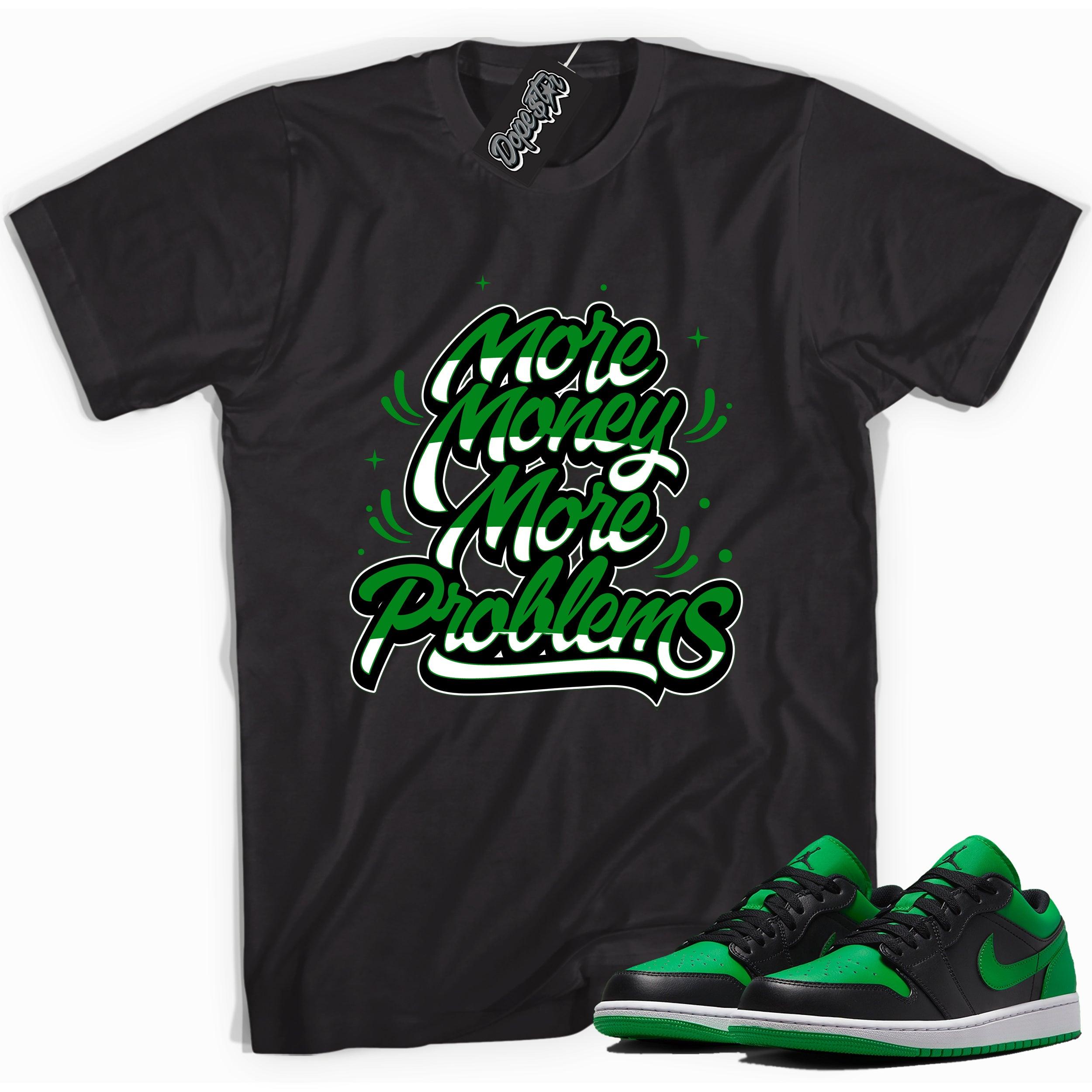 Cool black graphic tee with 'more money more problems' print, that perfectly matches Air Jordan 1 Low Lucky Green sneakers