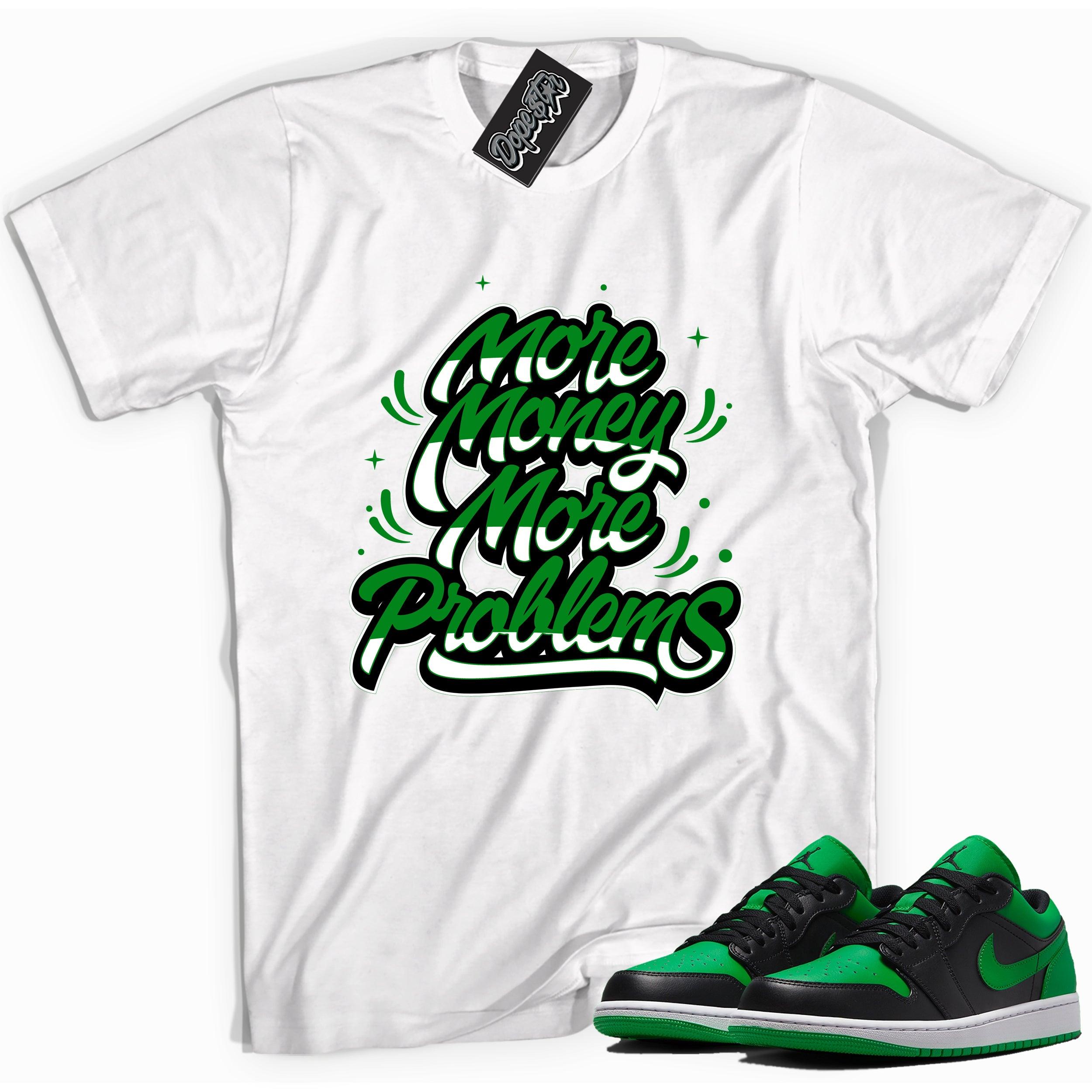 Cool white graphic tee with 'more money more problems' print, that perfectly matches Air Jordan 1 Low Lucky Green sneakers
